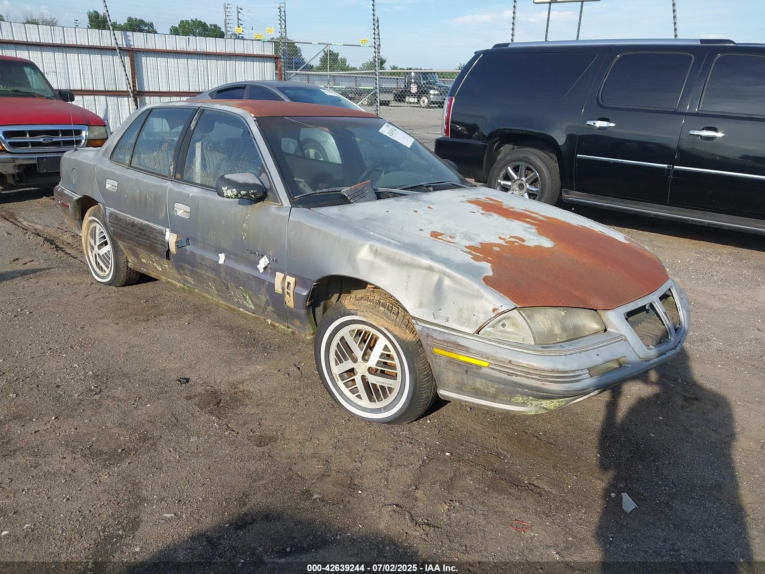 1992 Pontiac Grand Am, VIN 1G2NE54N3NM007717 — Перед