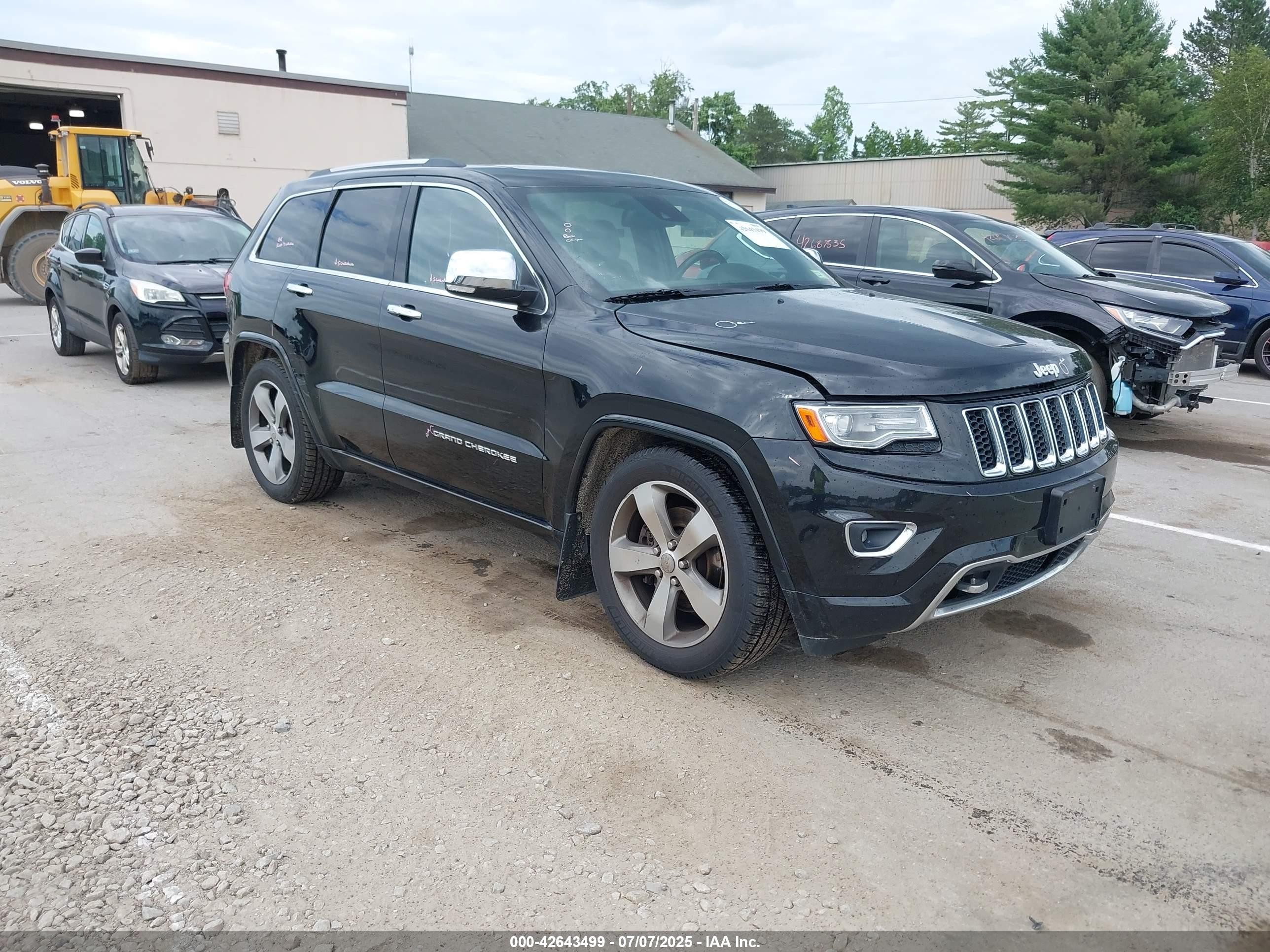 2014 Jeep Grand Cherokee Overland, VIN 1C4RJFCMXEC386678 — Зад