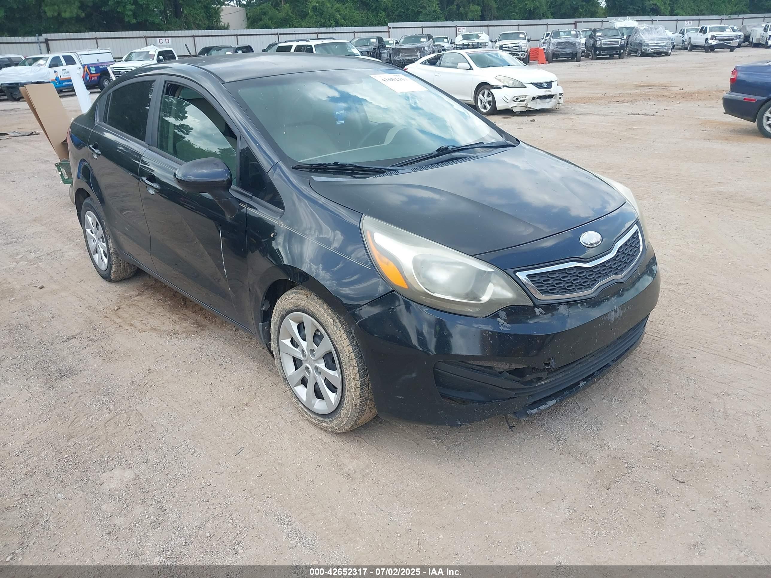 2013 Kia Rio LX, VIN KNADM4A36D6184947 — Side
