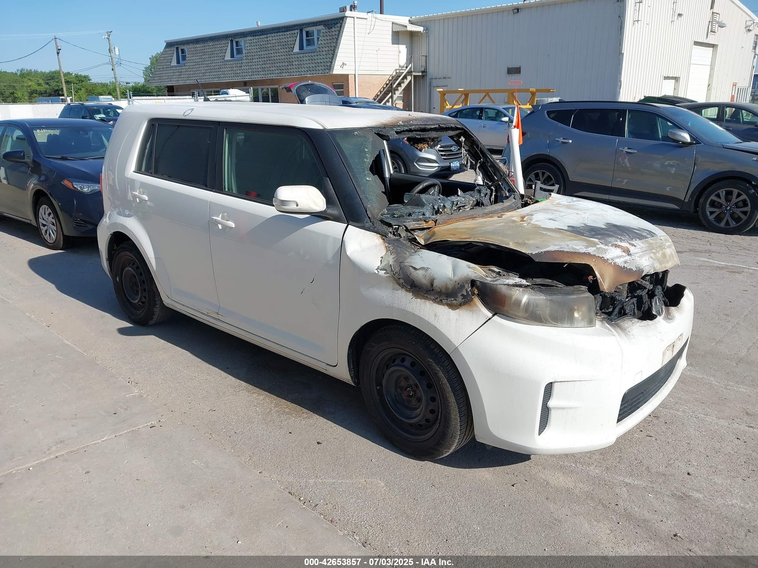 2012 Scion xB, VIN JTLZE4FE7CJ006058 — Engine fire