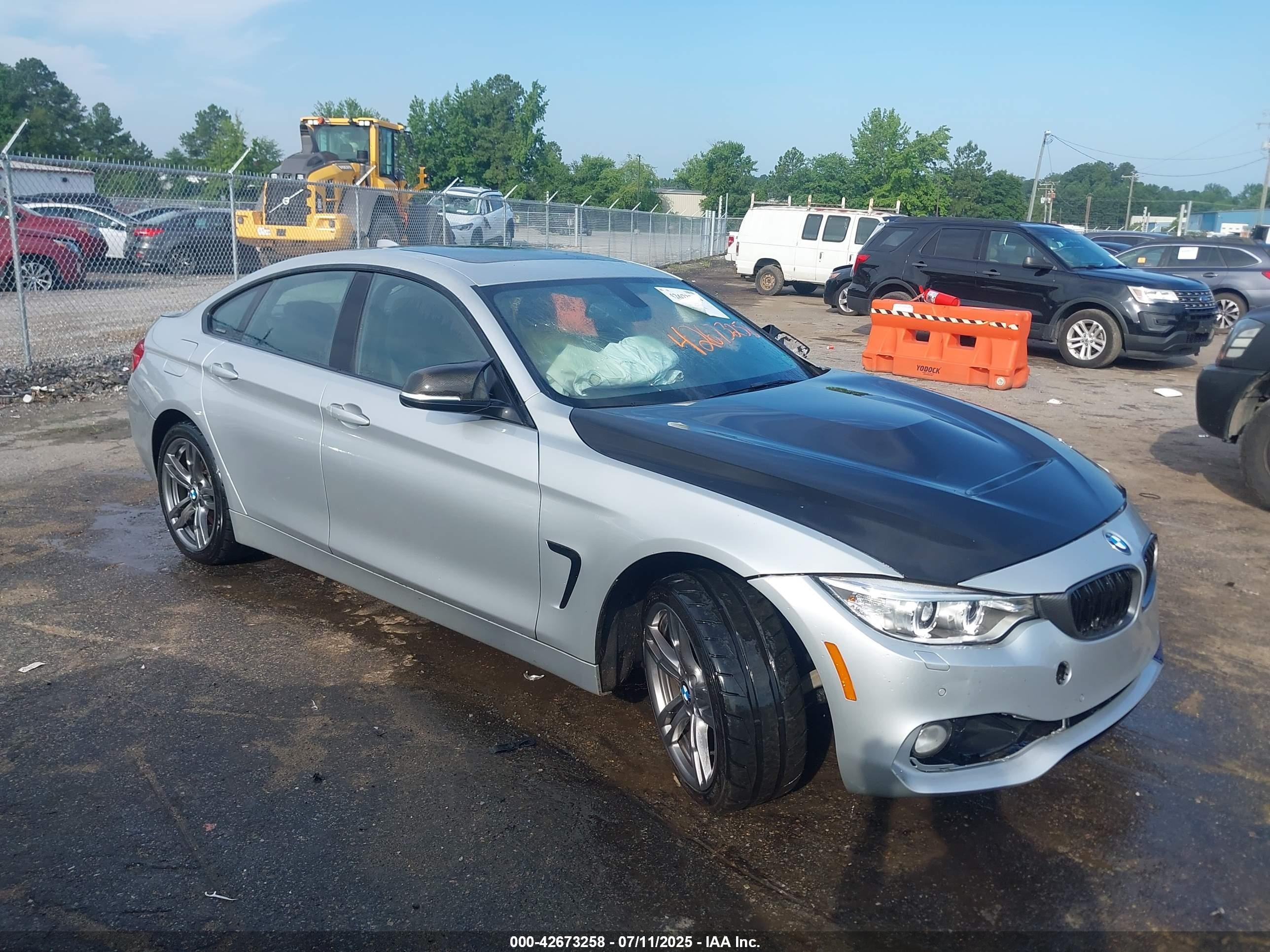 2015 BMW 4 Series 435i xDrive, VIN WBA4B3C53FD670242 — Side