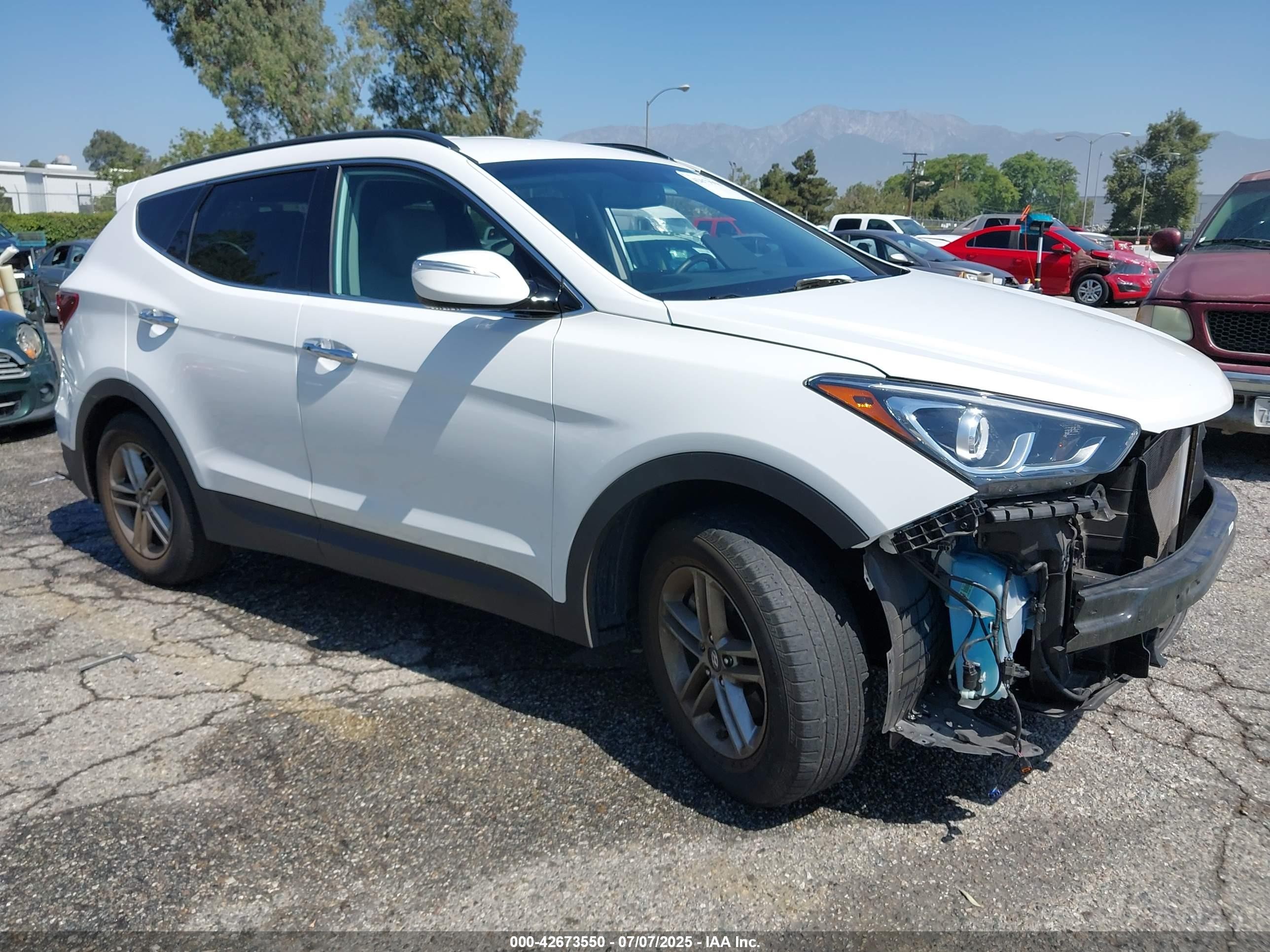 2017 Hyundai Santa Fe 2.4L, VIN 5XYZU3LB0HG437013 — Front end