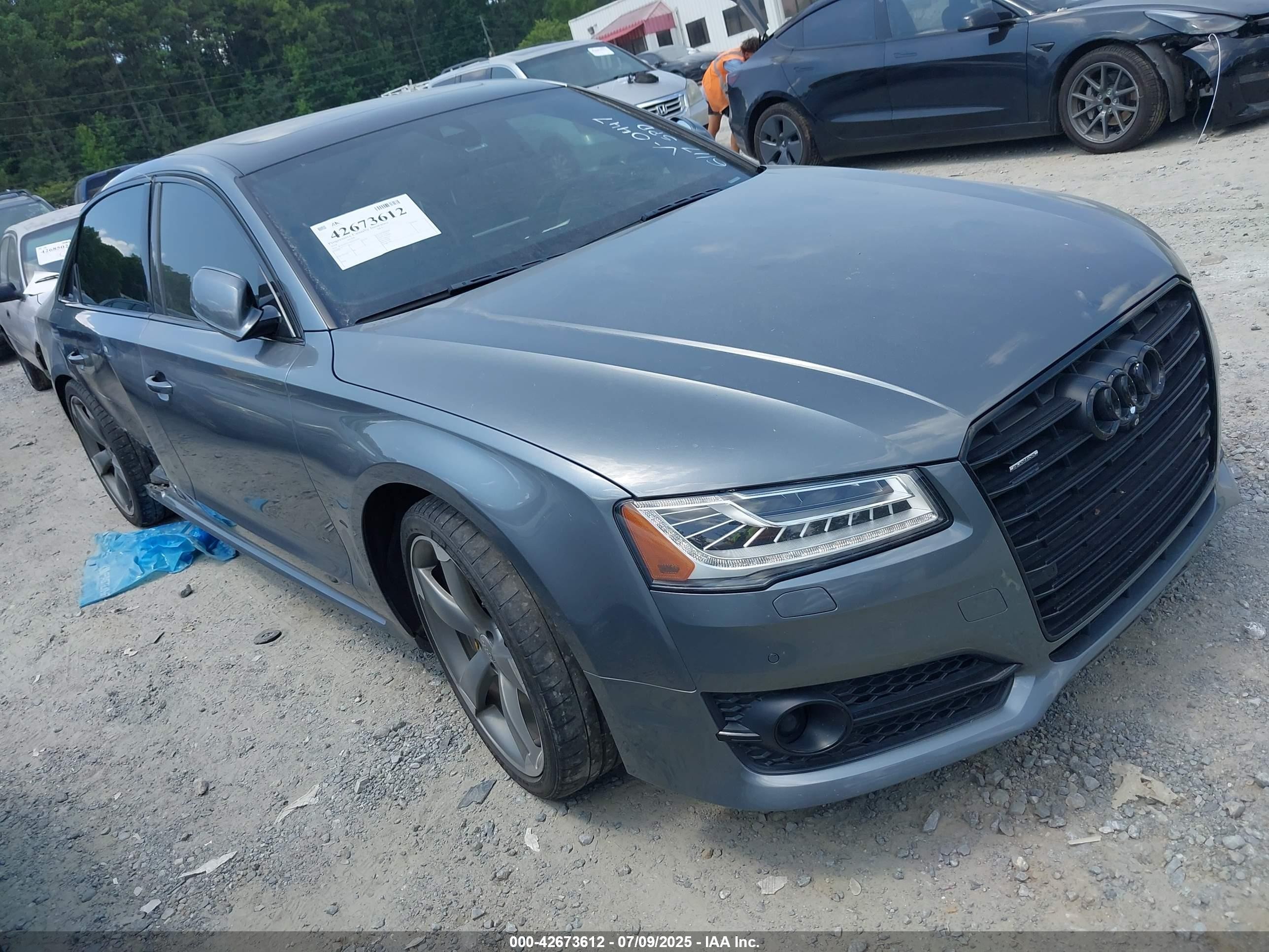 2018 Audi A8, VIN WAU44AFD8JN000447 — Side