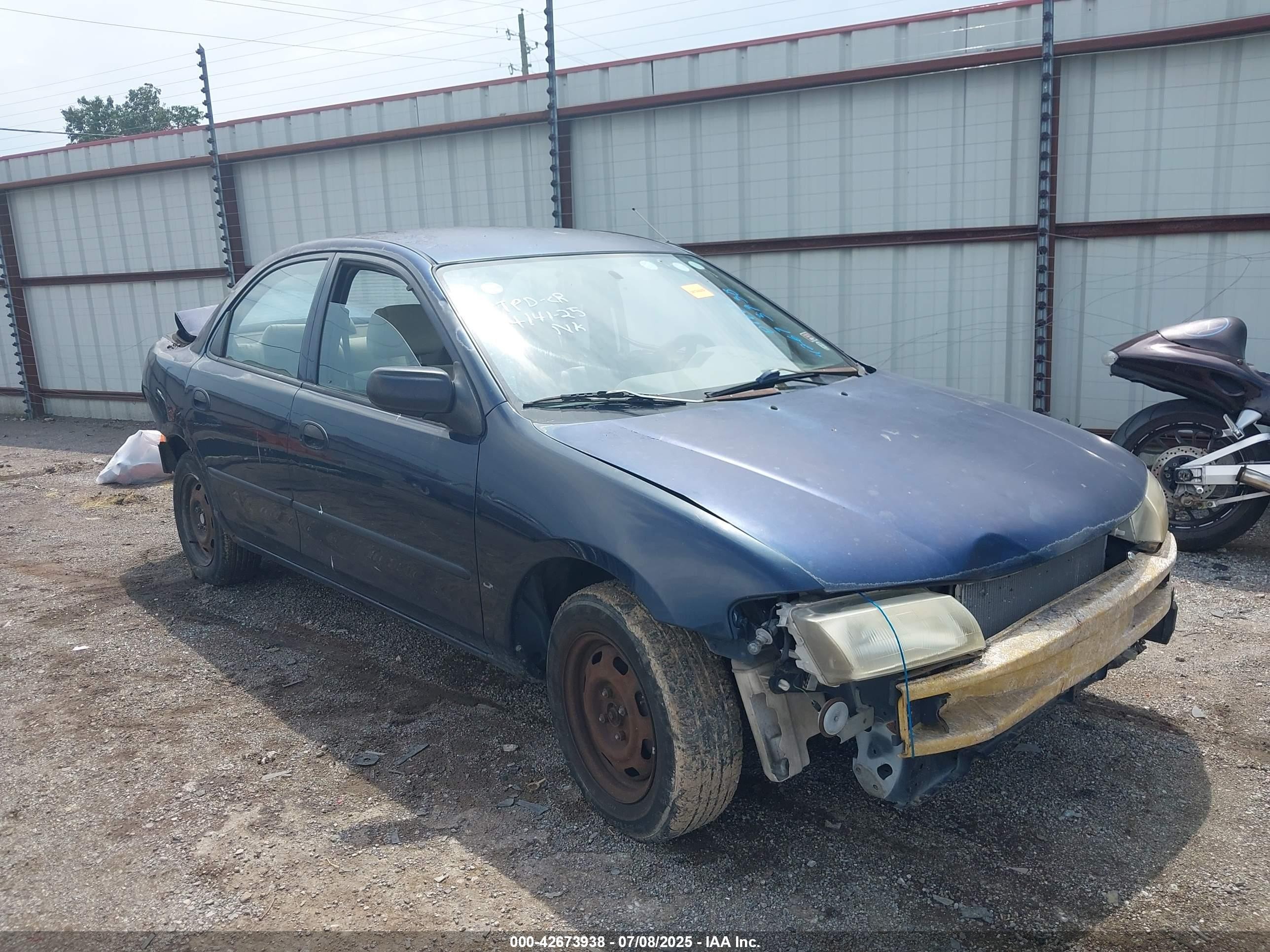1997 Mazda Protege DX, VIN JM1BC1412V0158629 — По всему кузову