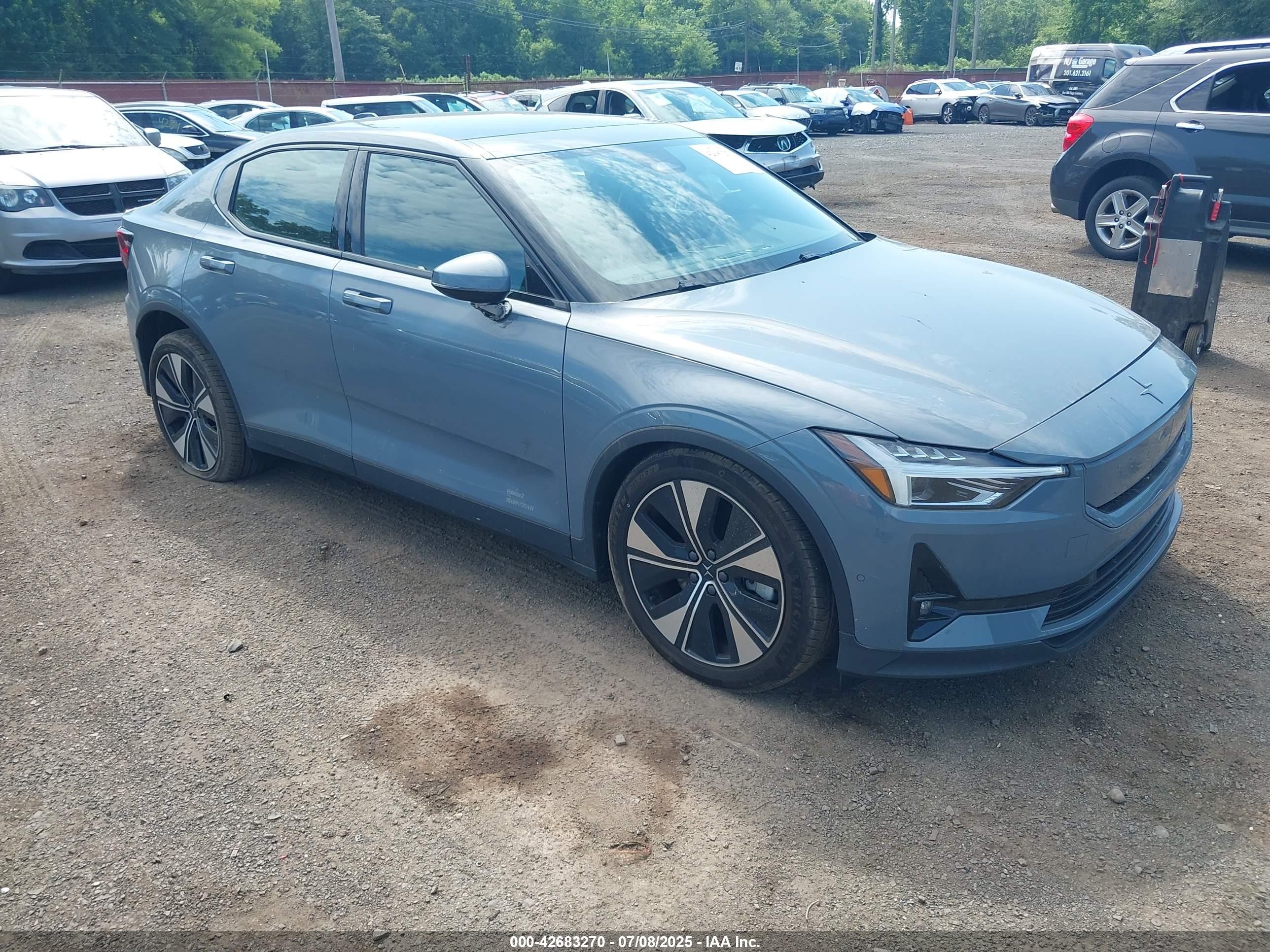 2024 Polestar 2, VIN YSMFD3KA5RL221809 — Бок