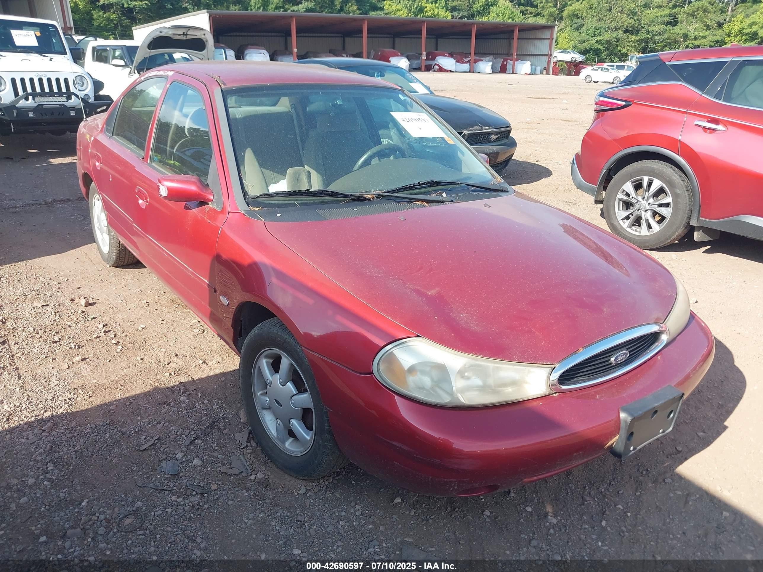 1999 Ford Contour SE, VIN 1FAFP6634XK143564 — Normal wear