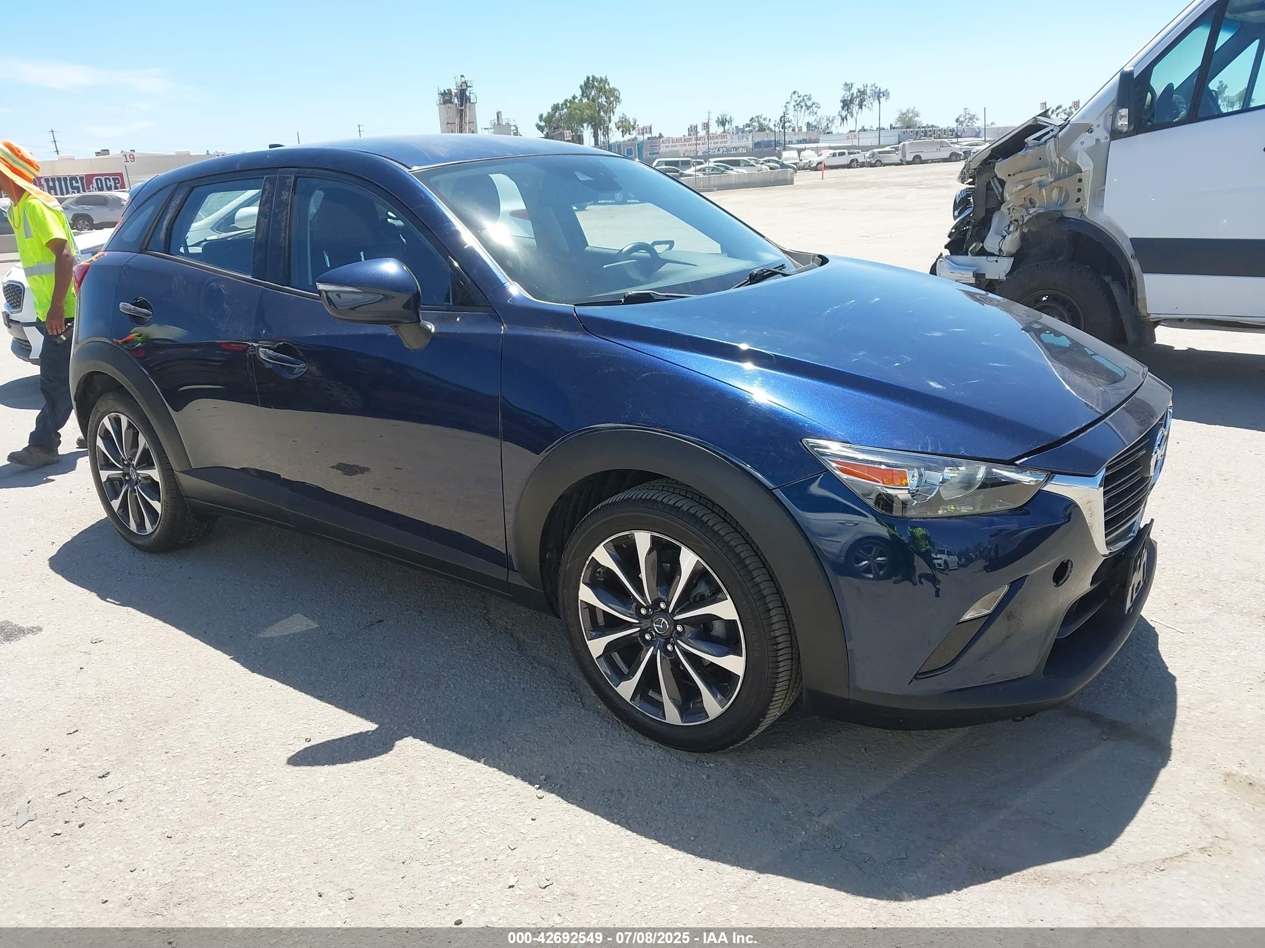 2019 Mazda CX-3 Touring, VIN JM1DKDC70K1430054 — Rear end