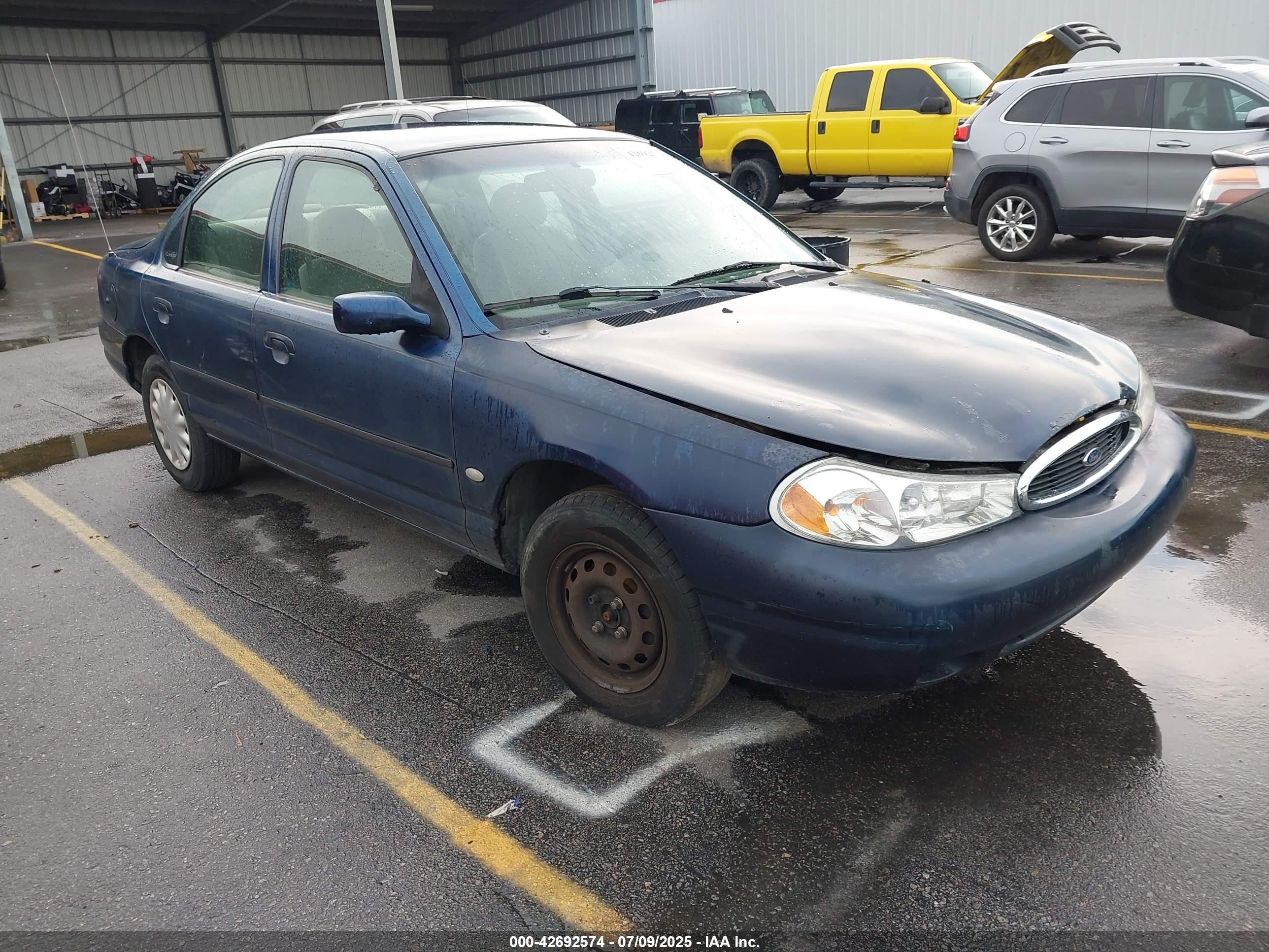 1998 Ford Contour, VIN 3FAFP663XWM122628 — Normal wear