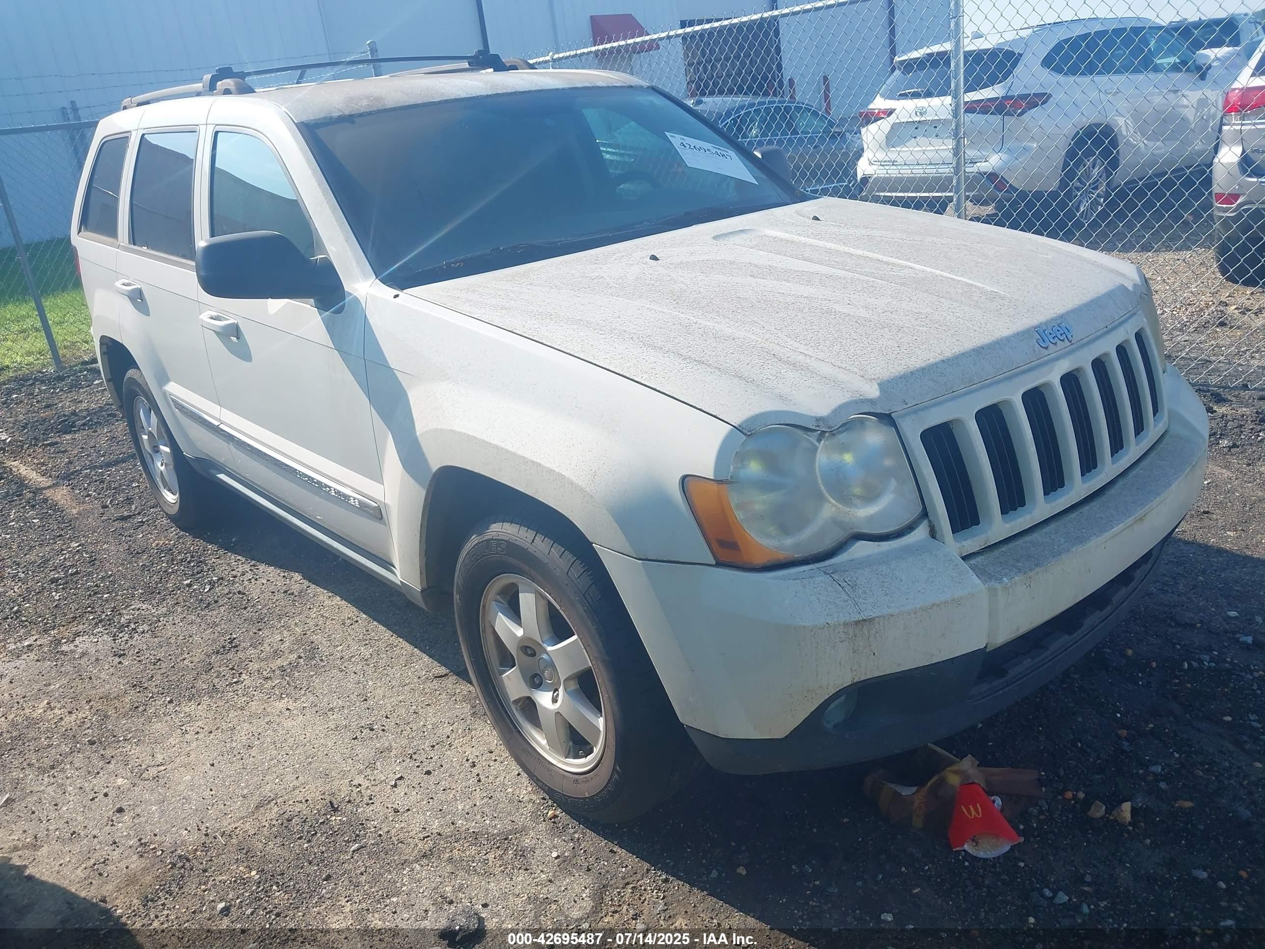 2010 Jeep Grand Cherokee Laredo, VIN 1J4PS4GK2AC156140 — Normal wear