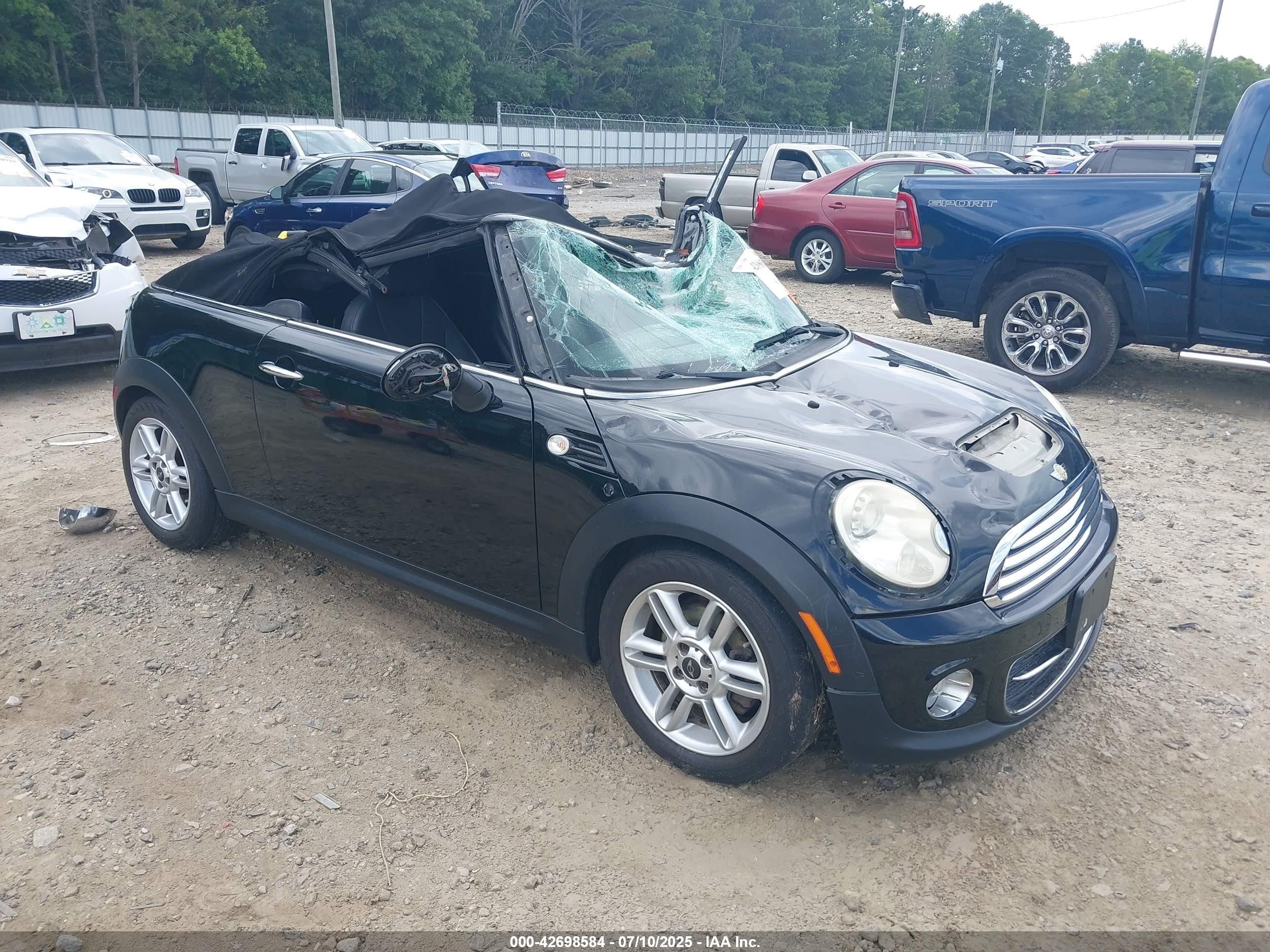 2011 MINI Convertible, VIN WMWZN3C55BTZ78056 — Storm