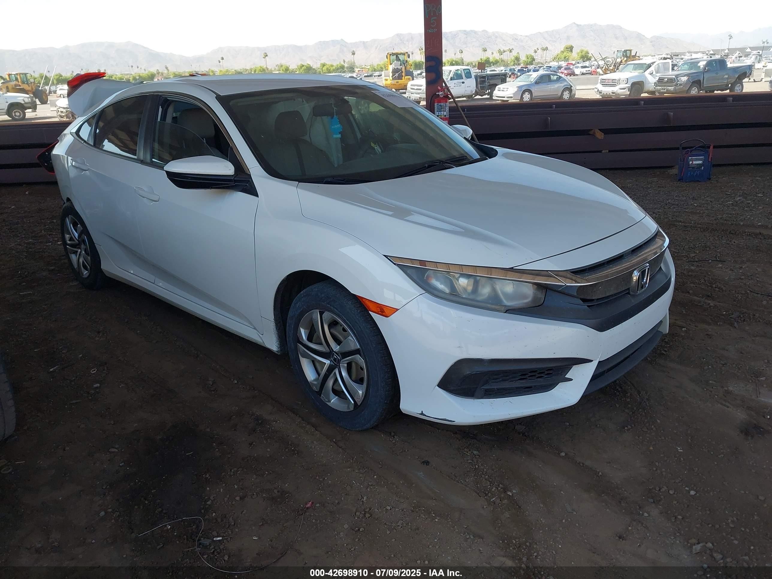 2016 Honda Civic LX, VIN 19XFC2F54GE049817 — Side