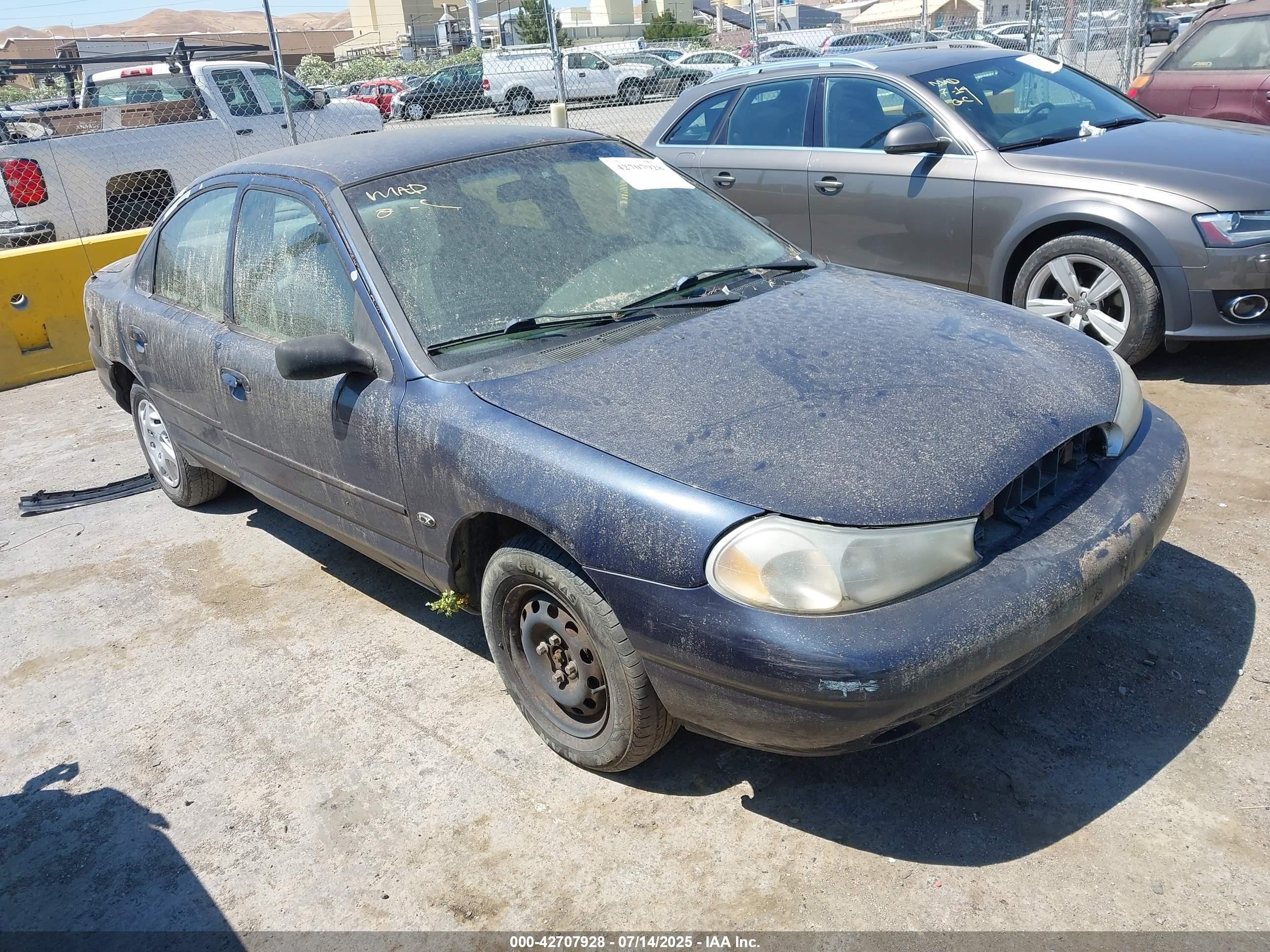 1998 Ford Contour, VIN 3FAFP6539WM121309 — Normal wear