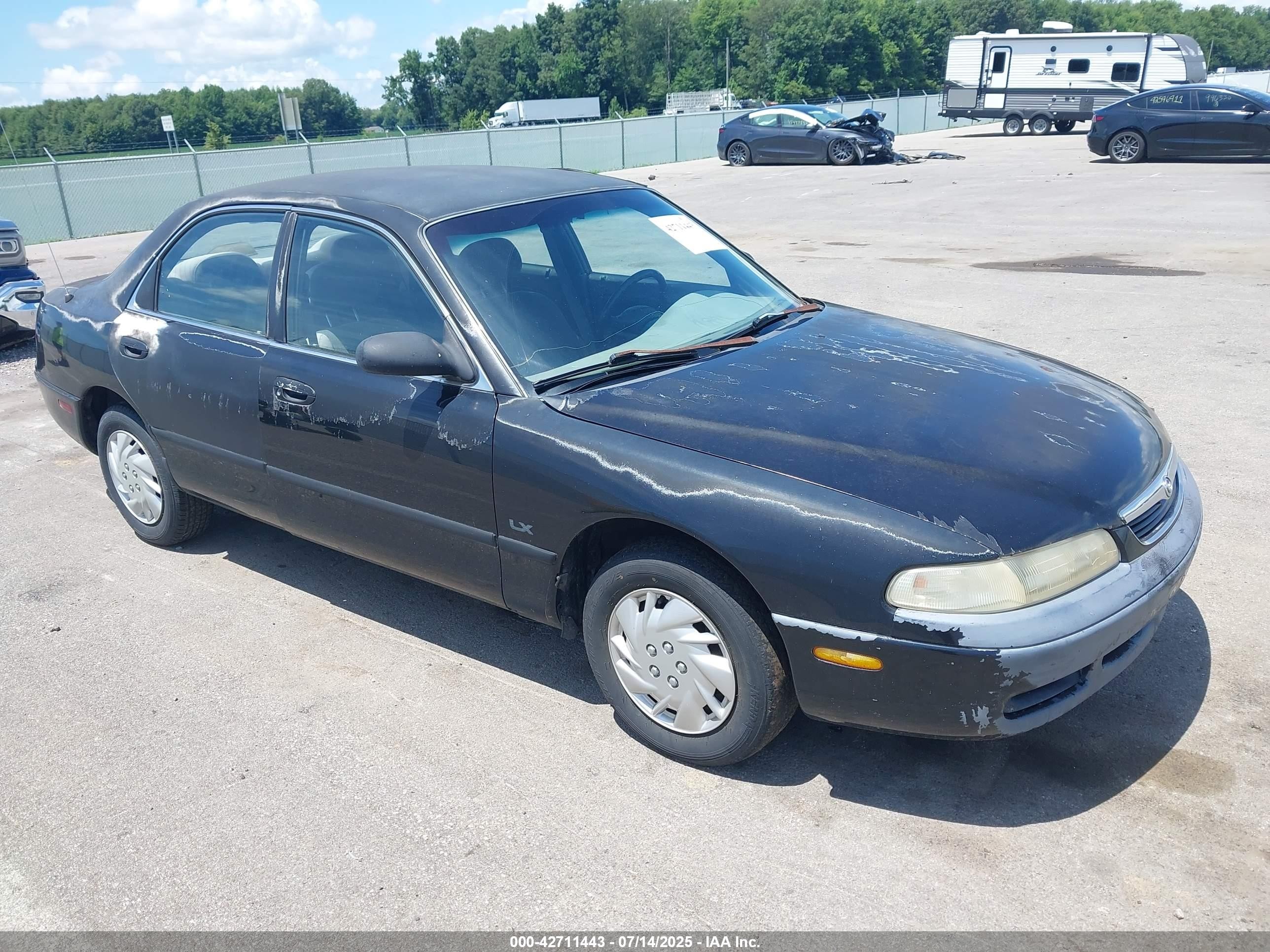 1996 Mazda 626 DX, VIN 1YVGE22C2T5556900 — Rear end