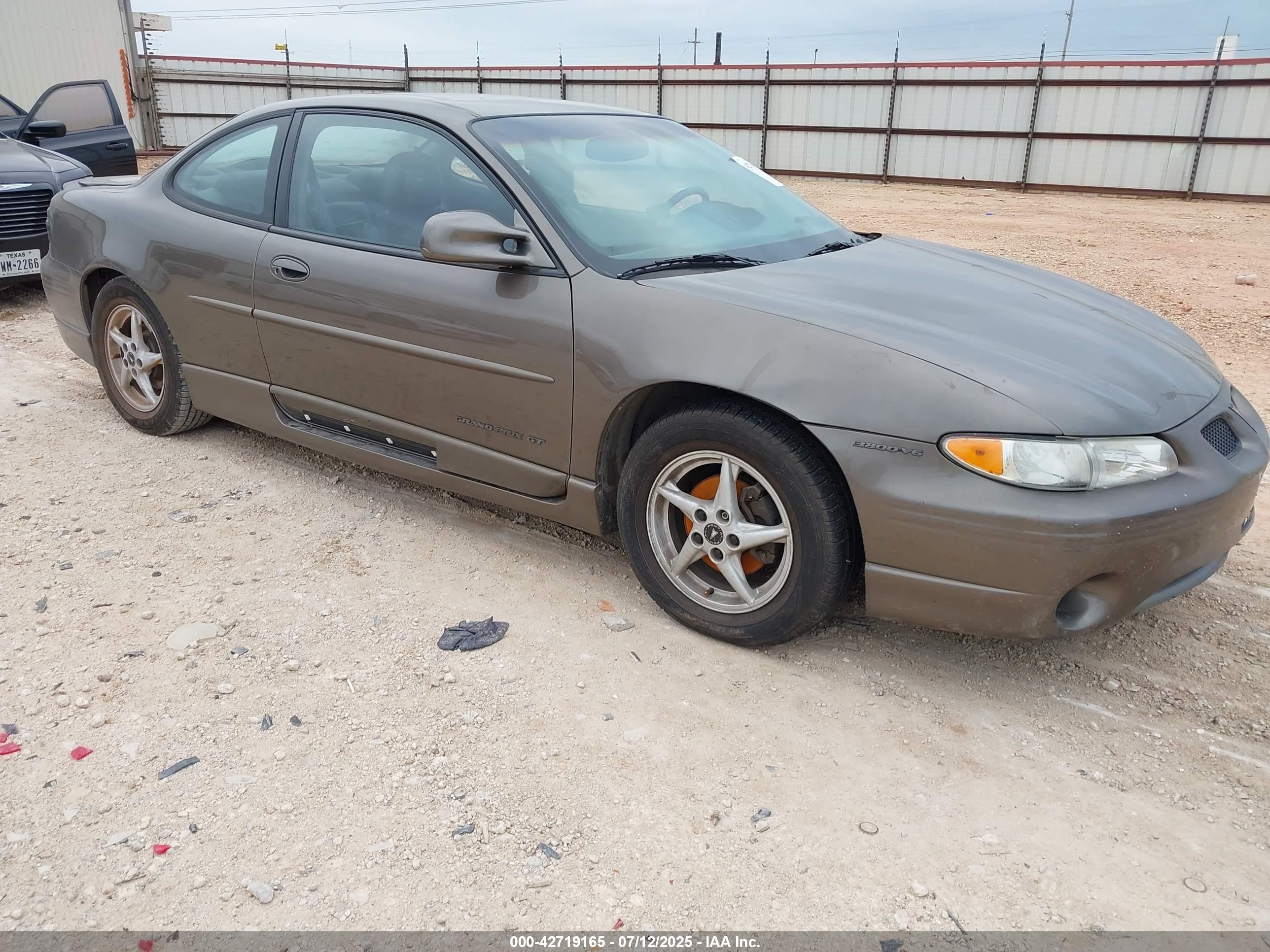 1999 Pontiac Grand Prix GT, VIN 1G2WP12K5XF351444 — Water / flood