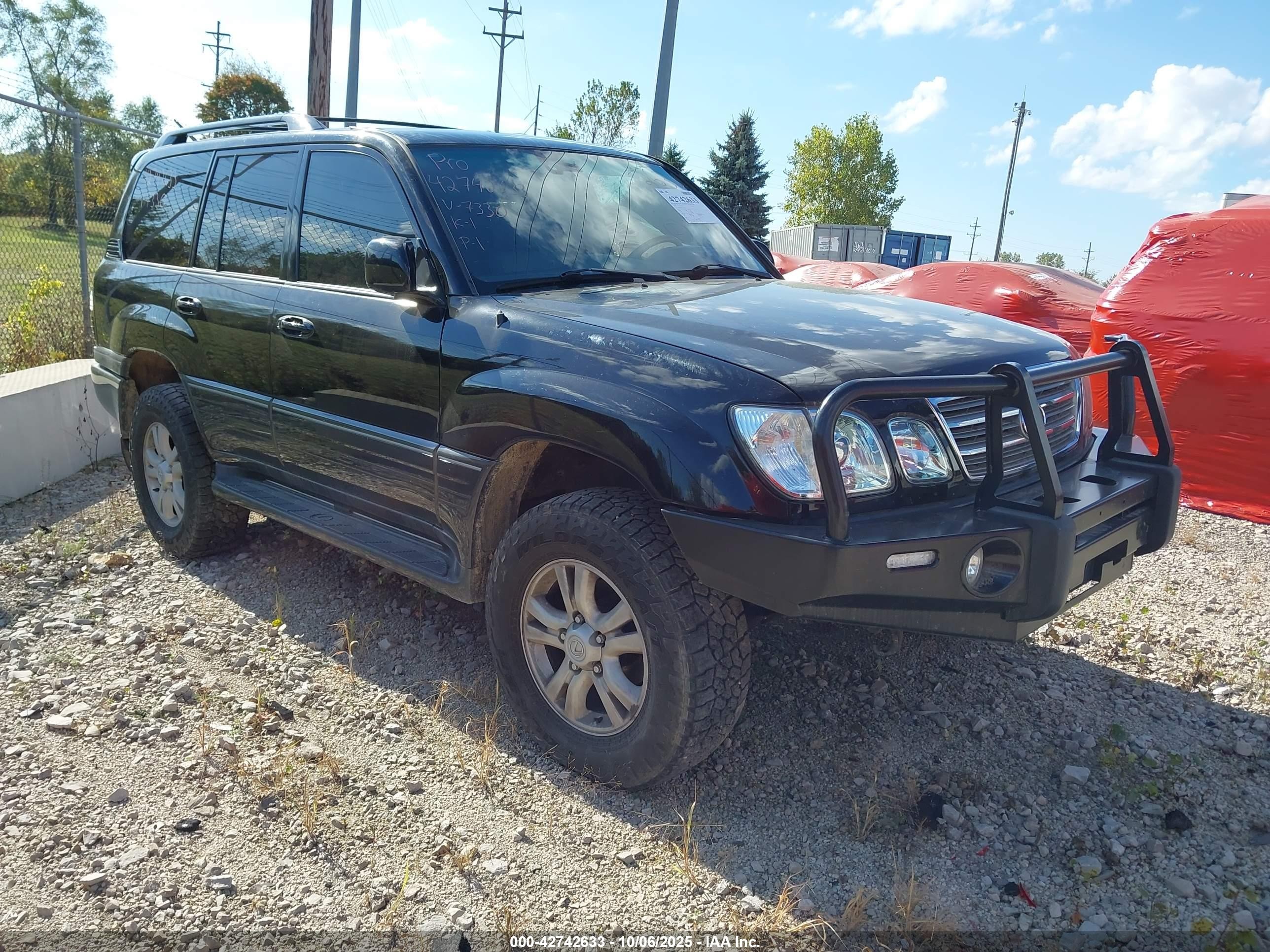 2004 Lexus LX 470, VIN JTJHT00W343547330 — Interior fire