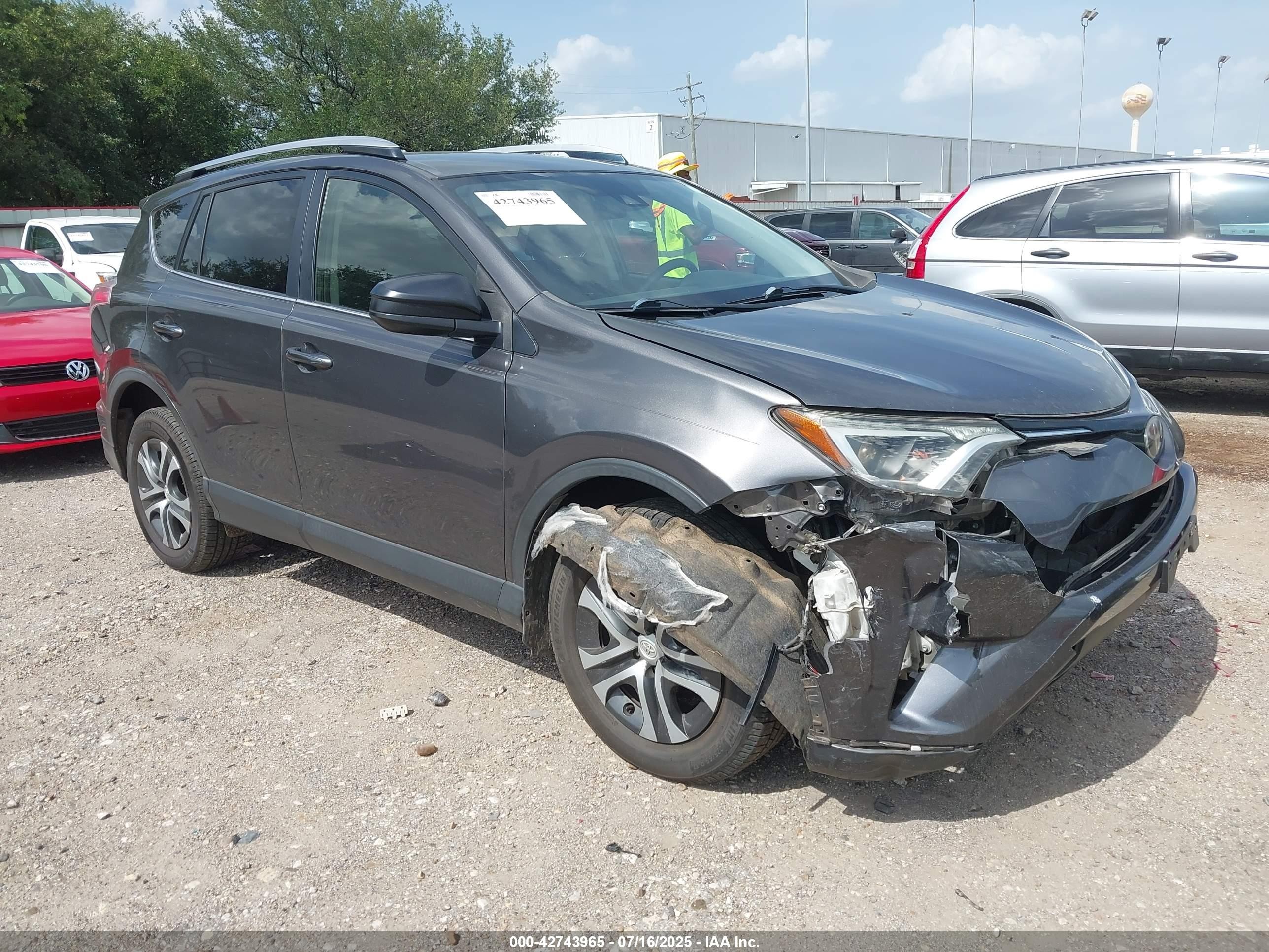2017 Toyota RAV4 LE, VIN JTMZFREV0HJ702209 — Front end