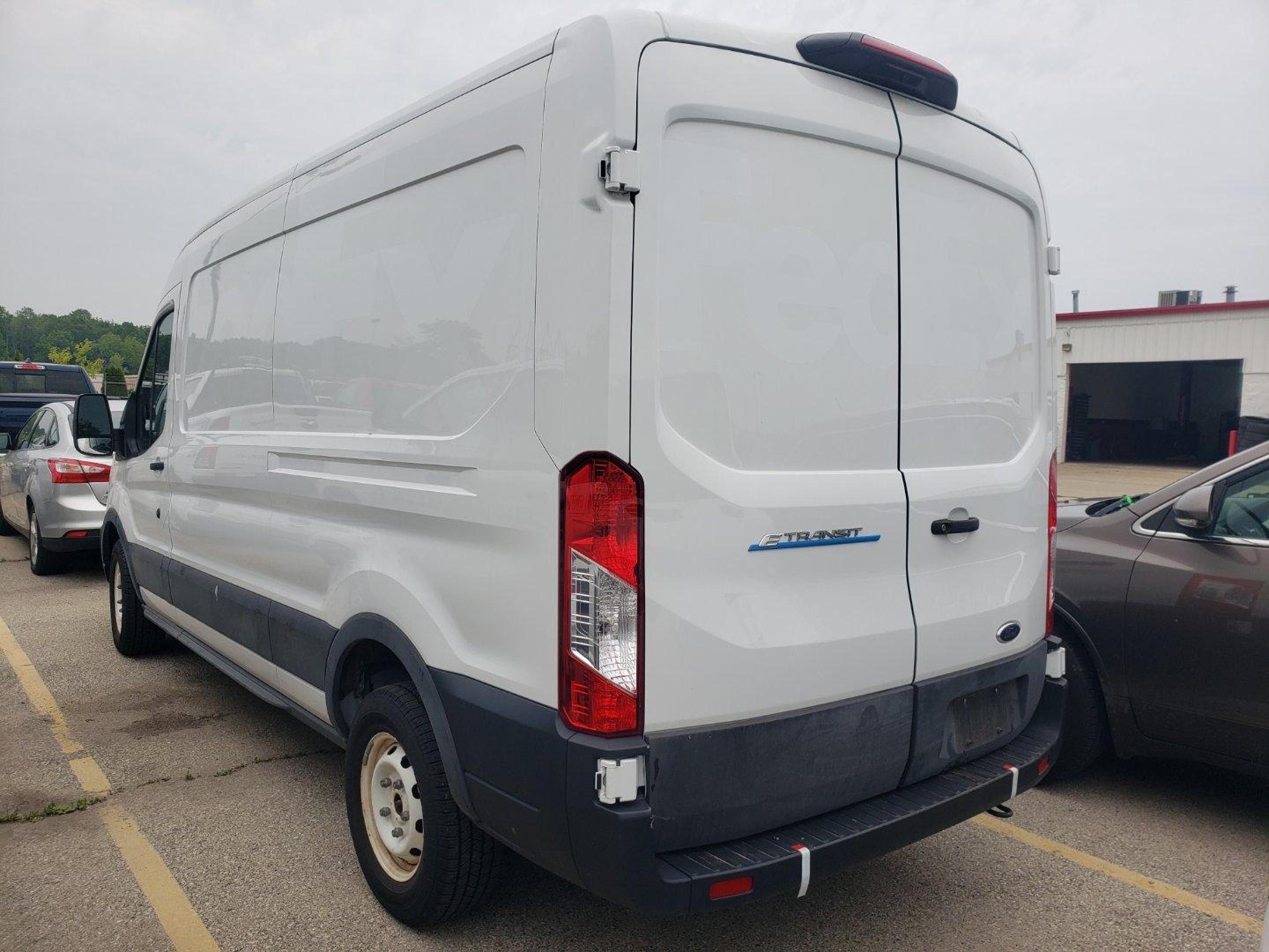 2022 Ford E-Transit Cargo, VIN 1FTBW9CK3NKA19999 — Normal wear