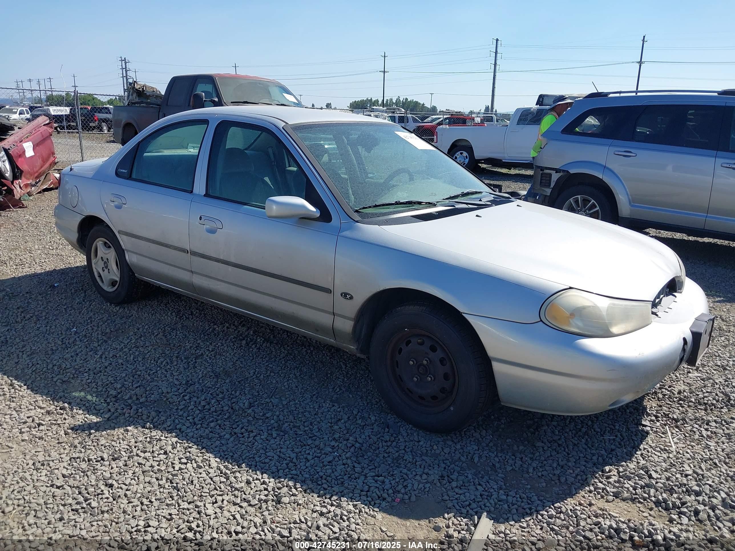 1999 Ford Contour LX, VIN 1FAFP653XXK167515 — Normal wear