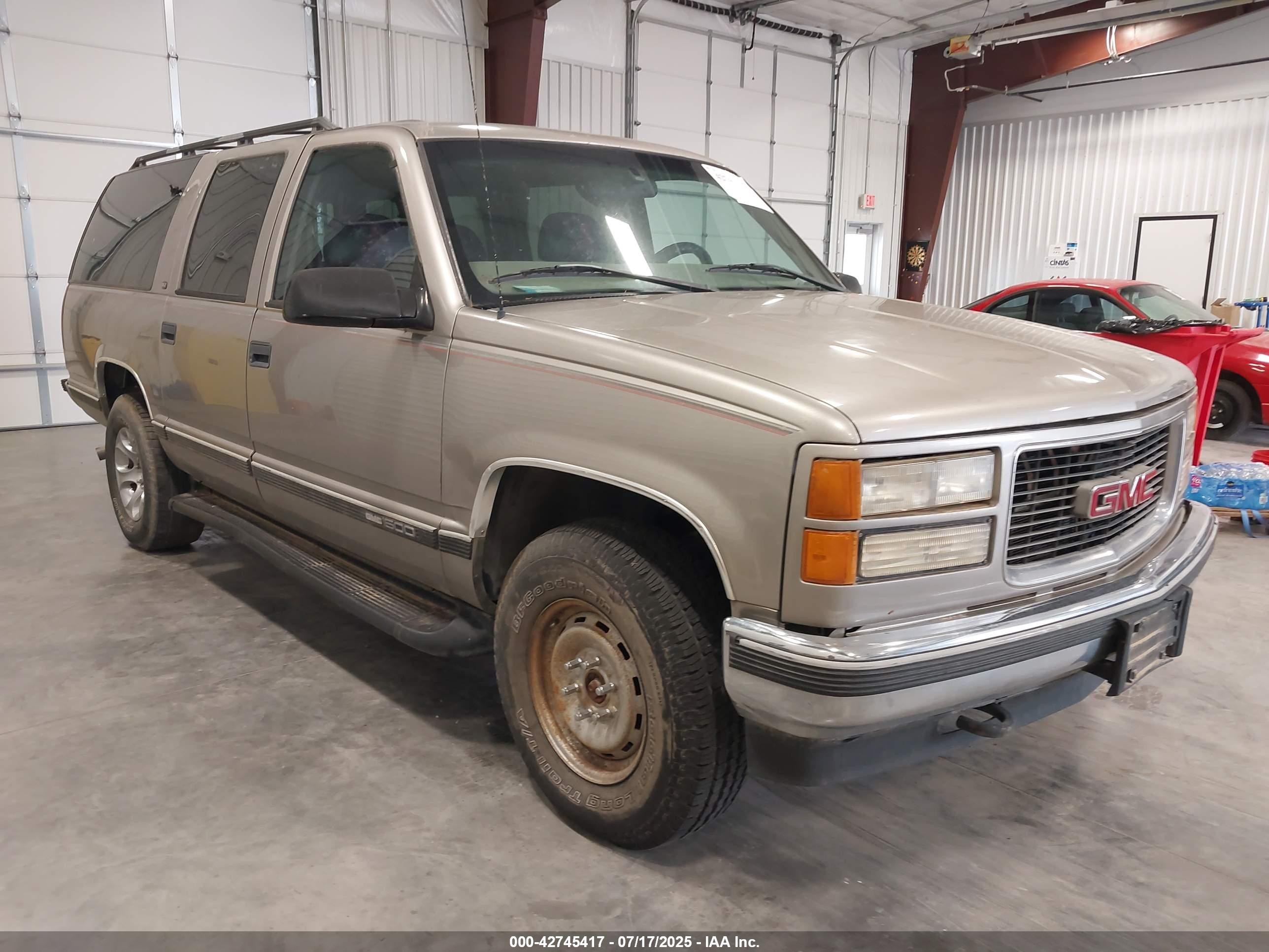 1999 GMC Suburban, VIN 3GKFK16R6XG537871 — Hail