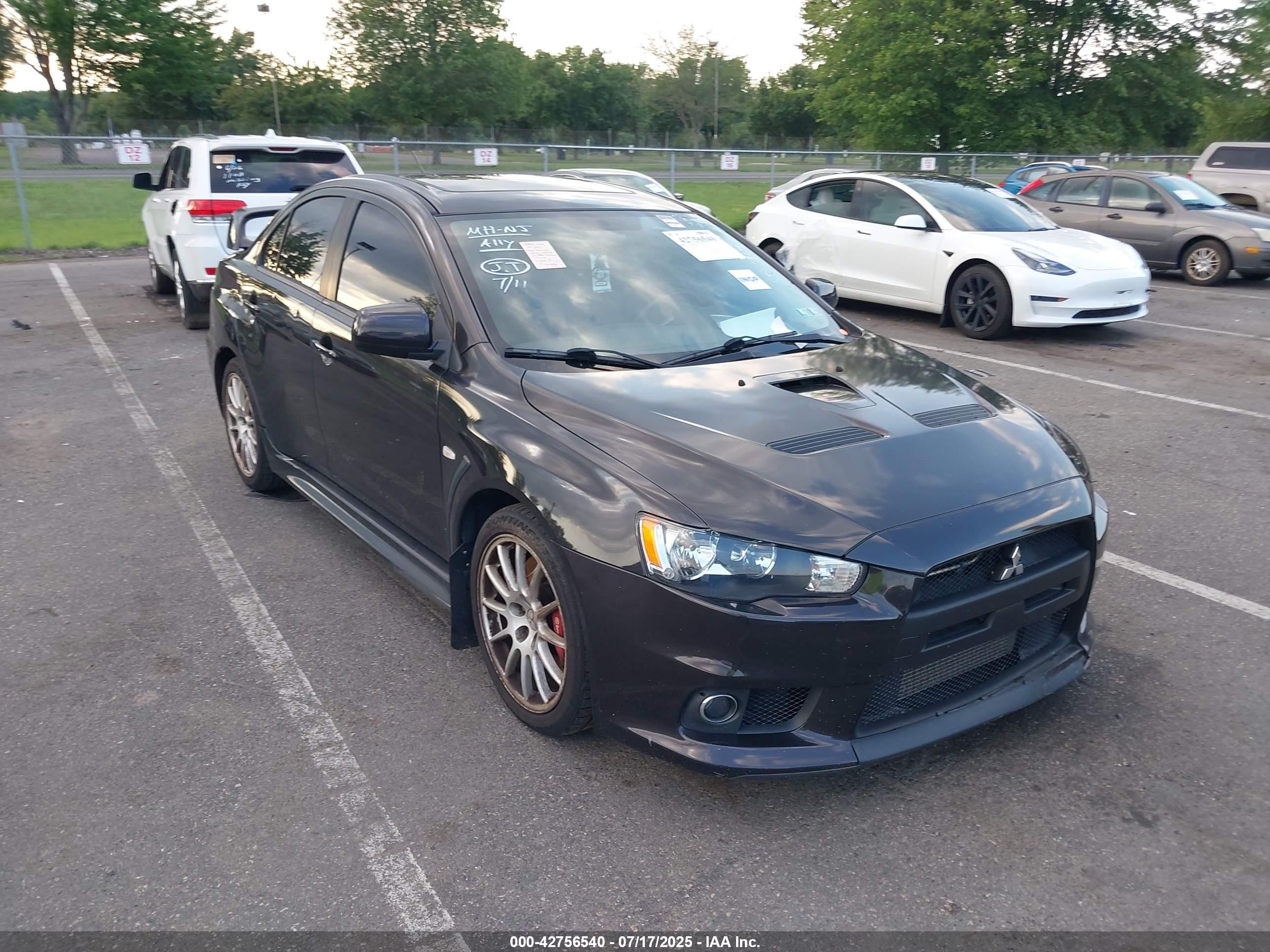 2014 Mitsubishi Lancer Evolution GSR, VIN JA32W8FV4EU024695 — Front end