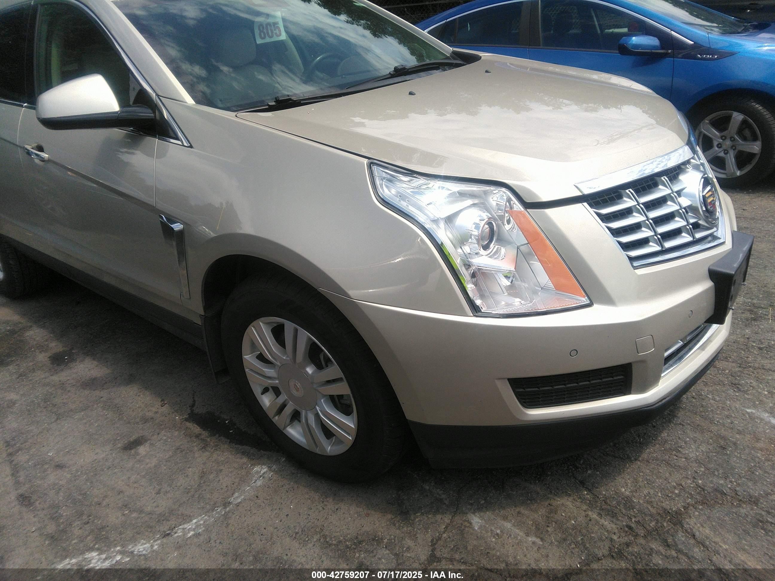 2015 Cadillac SRX Luxury Collection, VIN 3GYFNBE38FS622867 — Fresh water flood