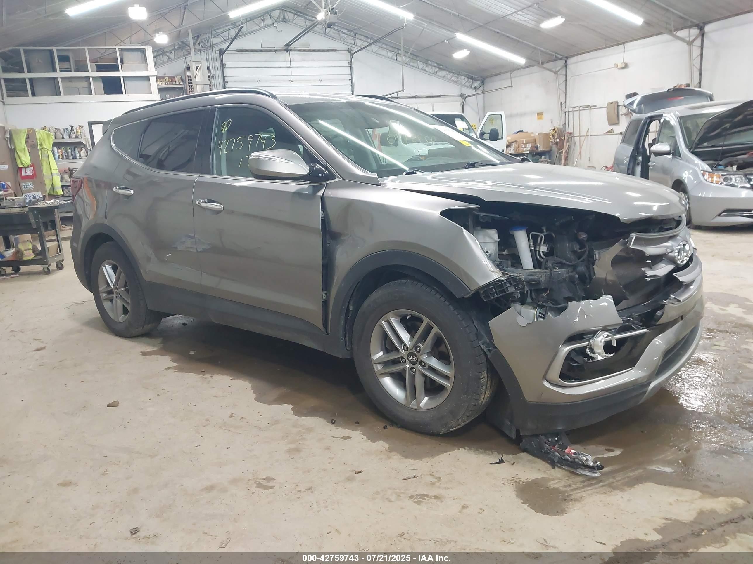 2017 Hyundai Santa Fe 2.4L, VIN 5NMZUDLB3HH050077 — Front end