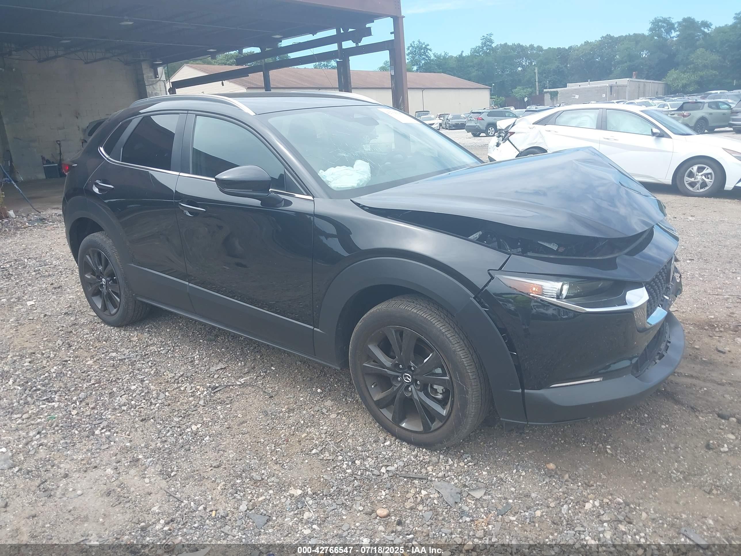 2024 Mazda CX-30 S Select Sport, VIN 3MVDMBBMXRM703373 — Front end