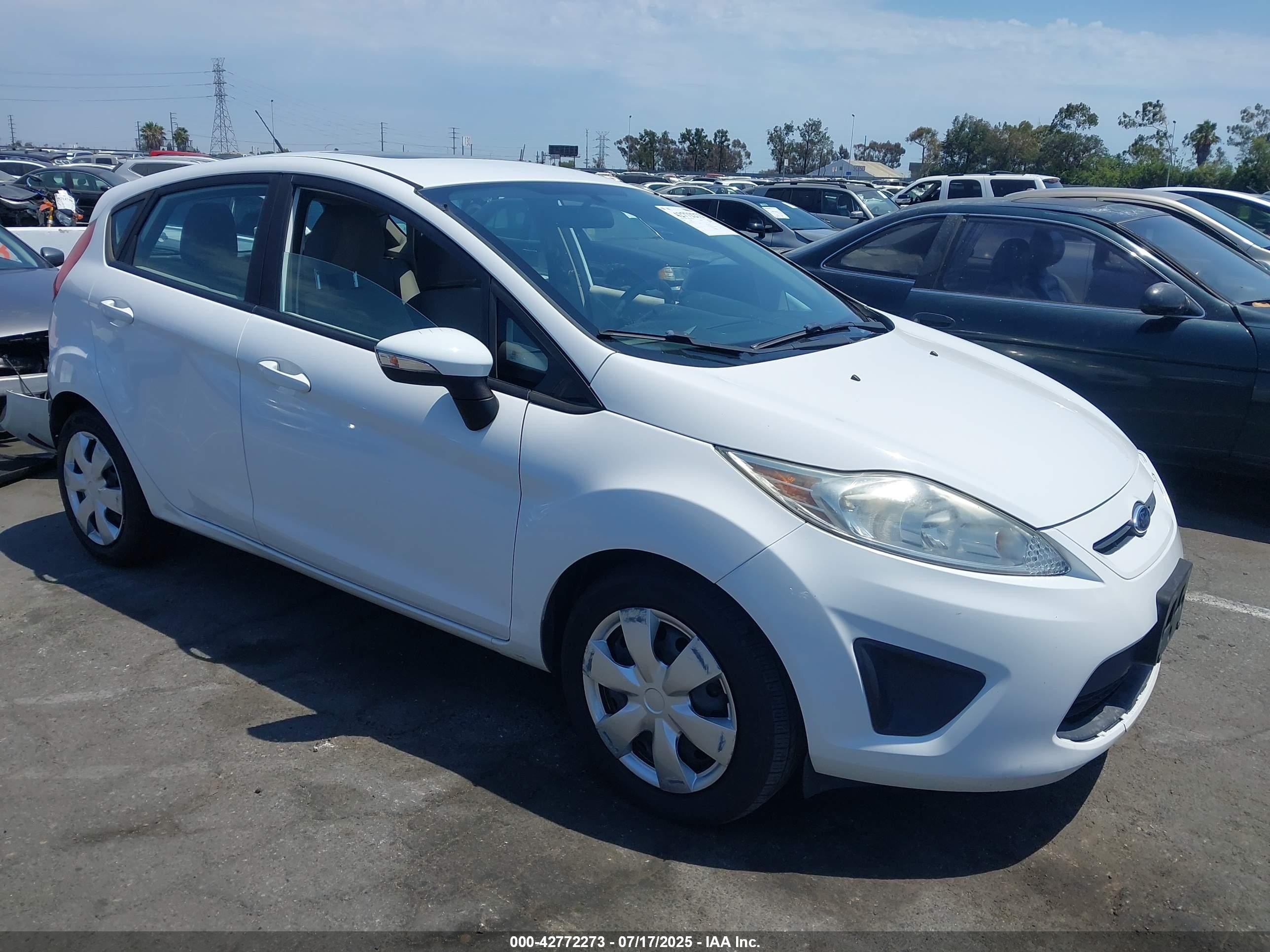 2013 Ford Fiesta SE, VIN 3FADP4EJ2DM177633 — Rear end