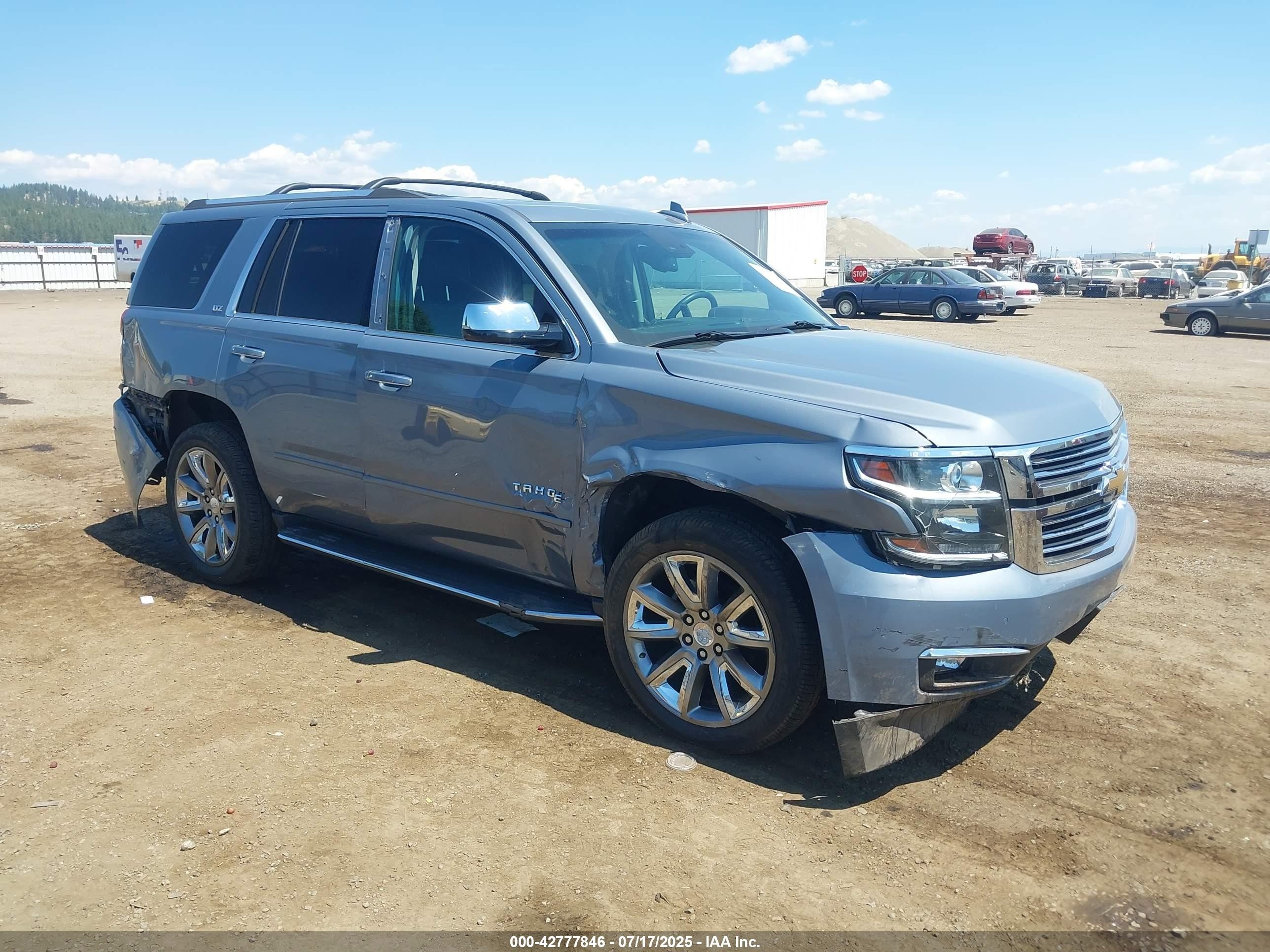 2015 Chevrolet Tahoe LTZ, VIN 1GNSKCKC0FR610018 — Side