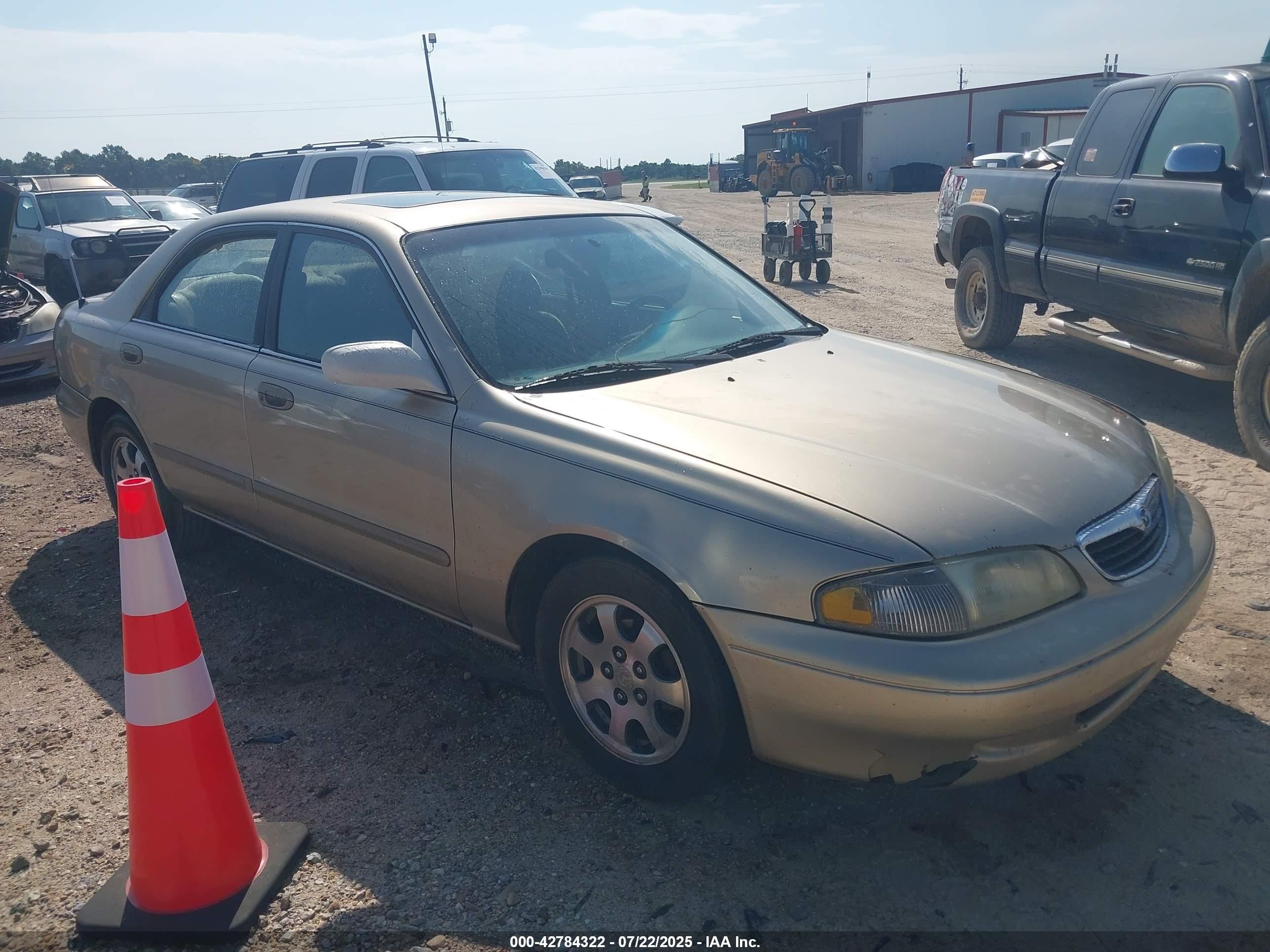 1999 Mazda 626 ES, VIN 1YVGF22C9X5878131 — Front end