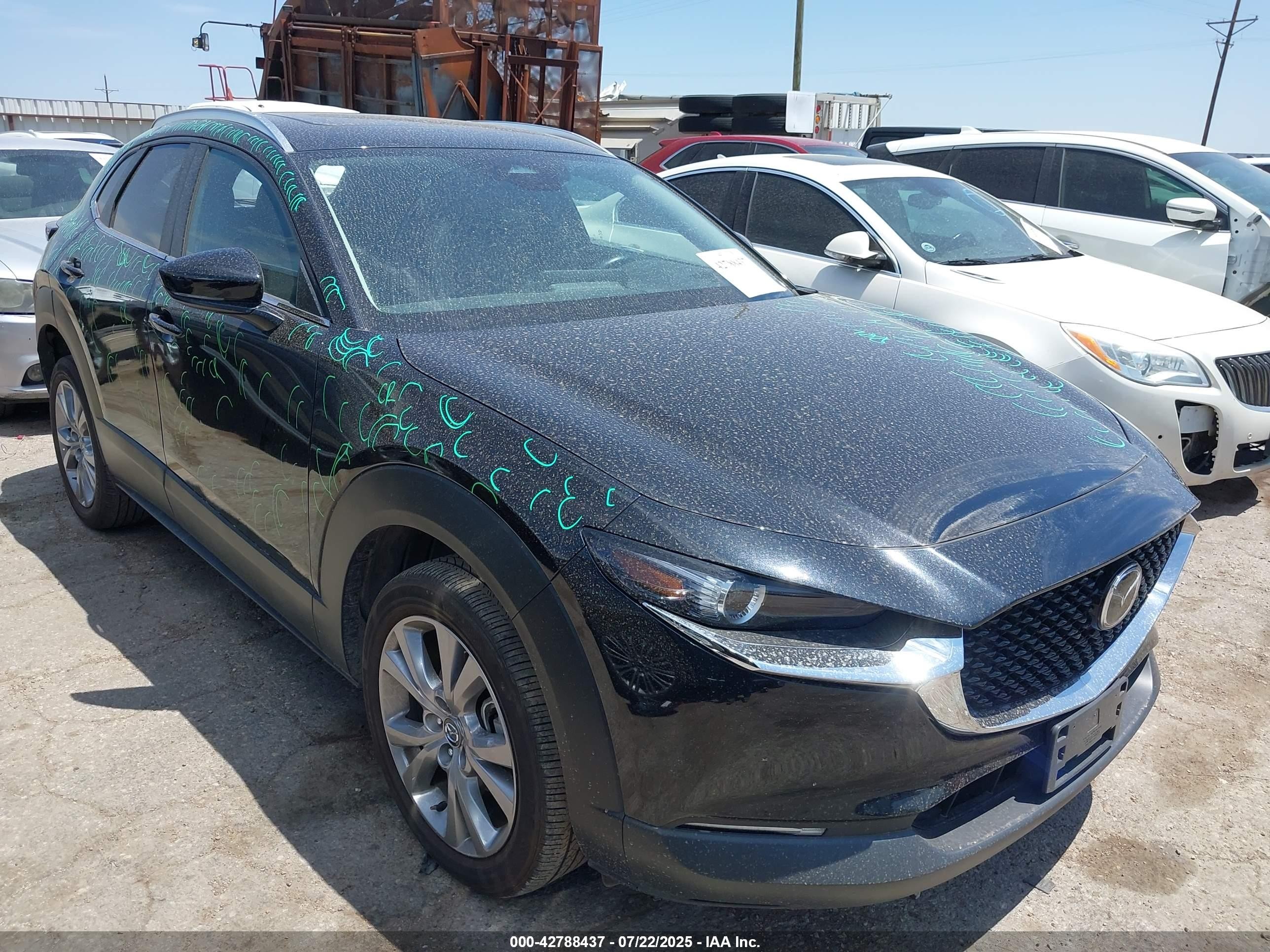 2024 Mazda CX-30 S Carbon Edition, VIN 3MVDMBCM4RM650779 — Hail