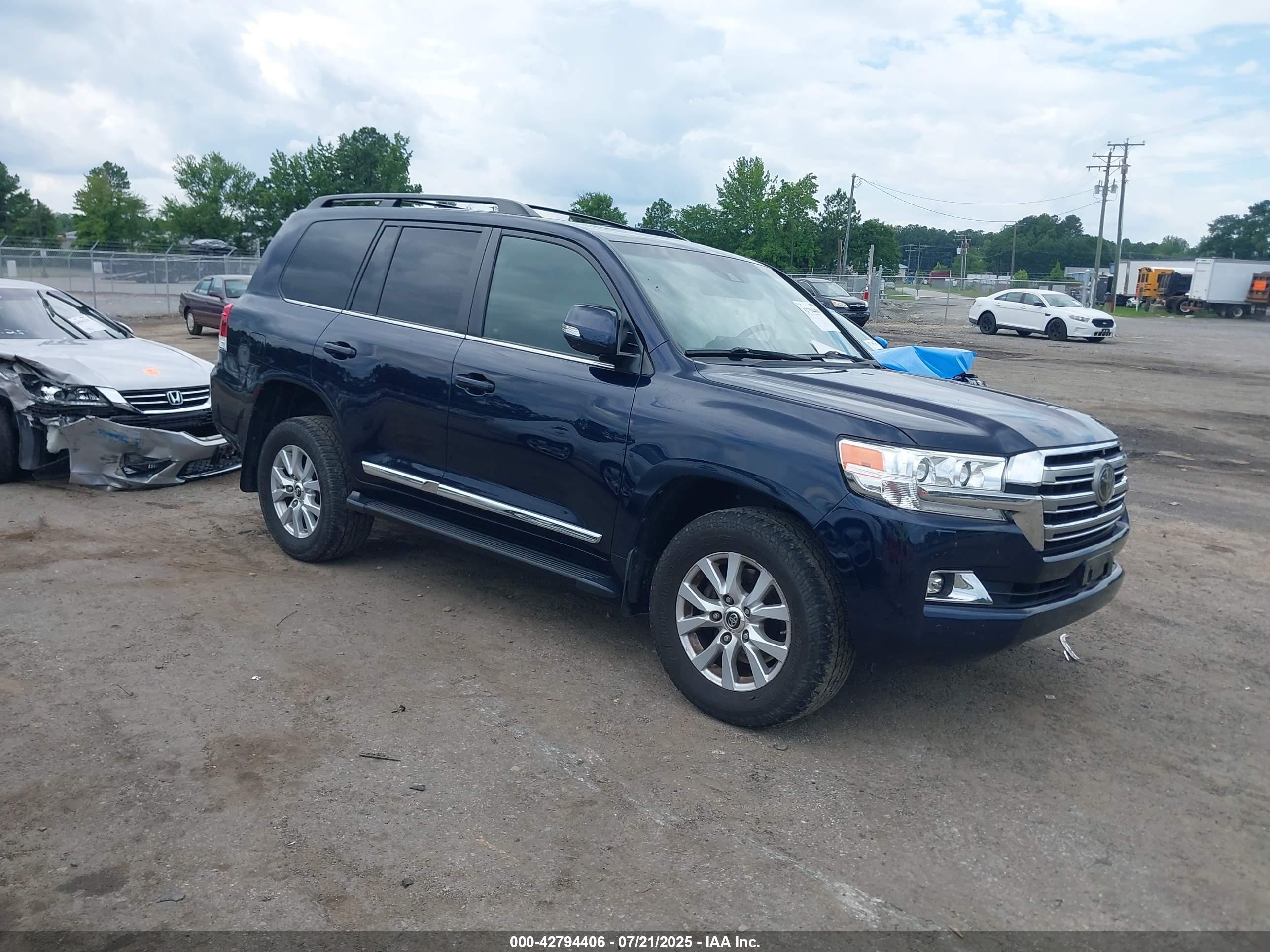 2019 Toyota Land Cruiser, VIN JTMCY7AJ4K4080923 — Side