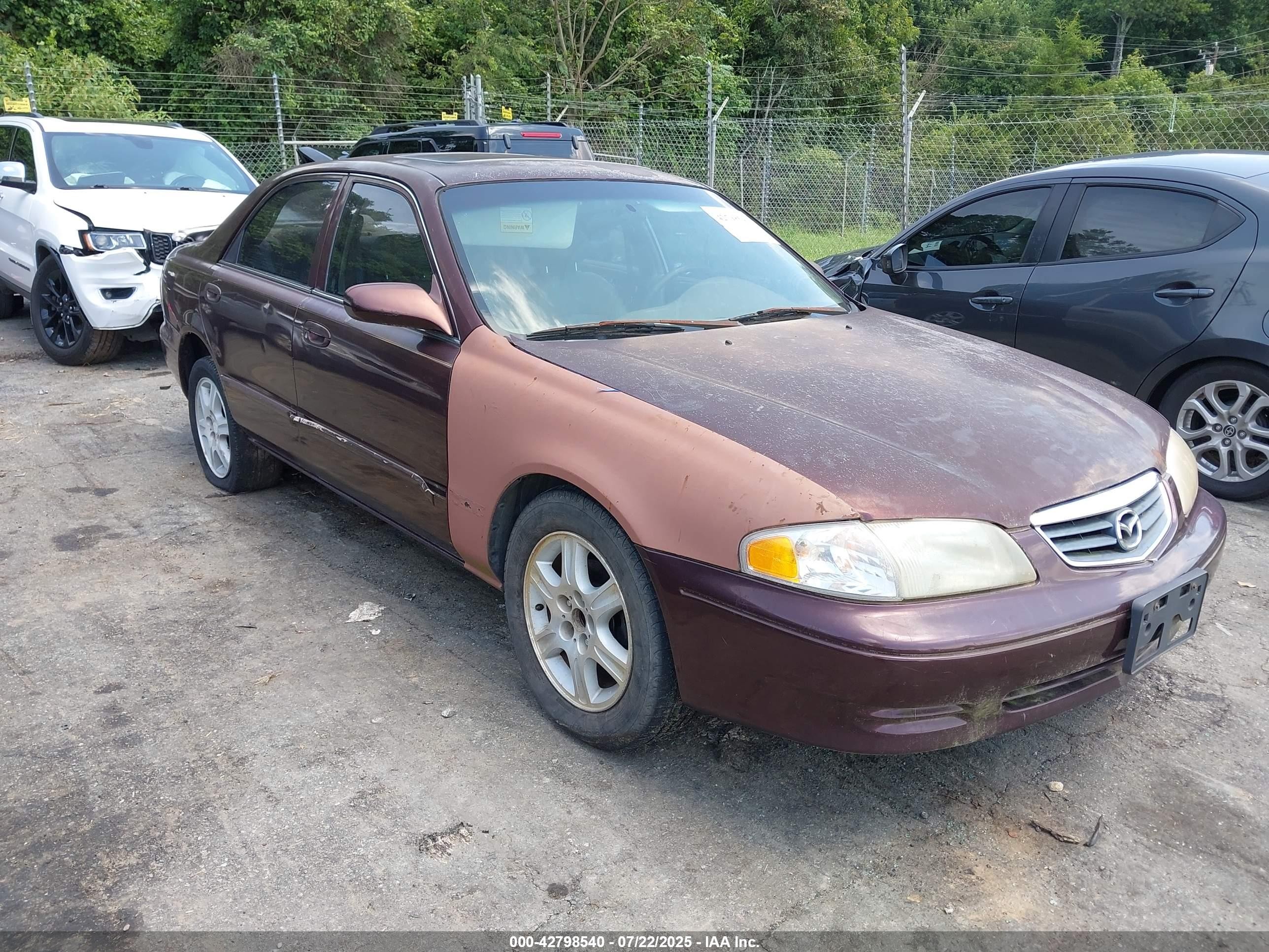 2000 Mazda 626 LX, VIN 1YVGF22D6Y5129992 — Front end