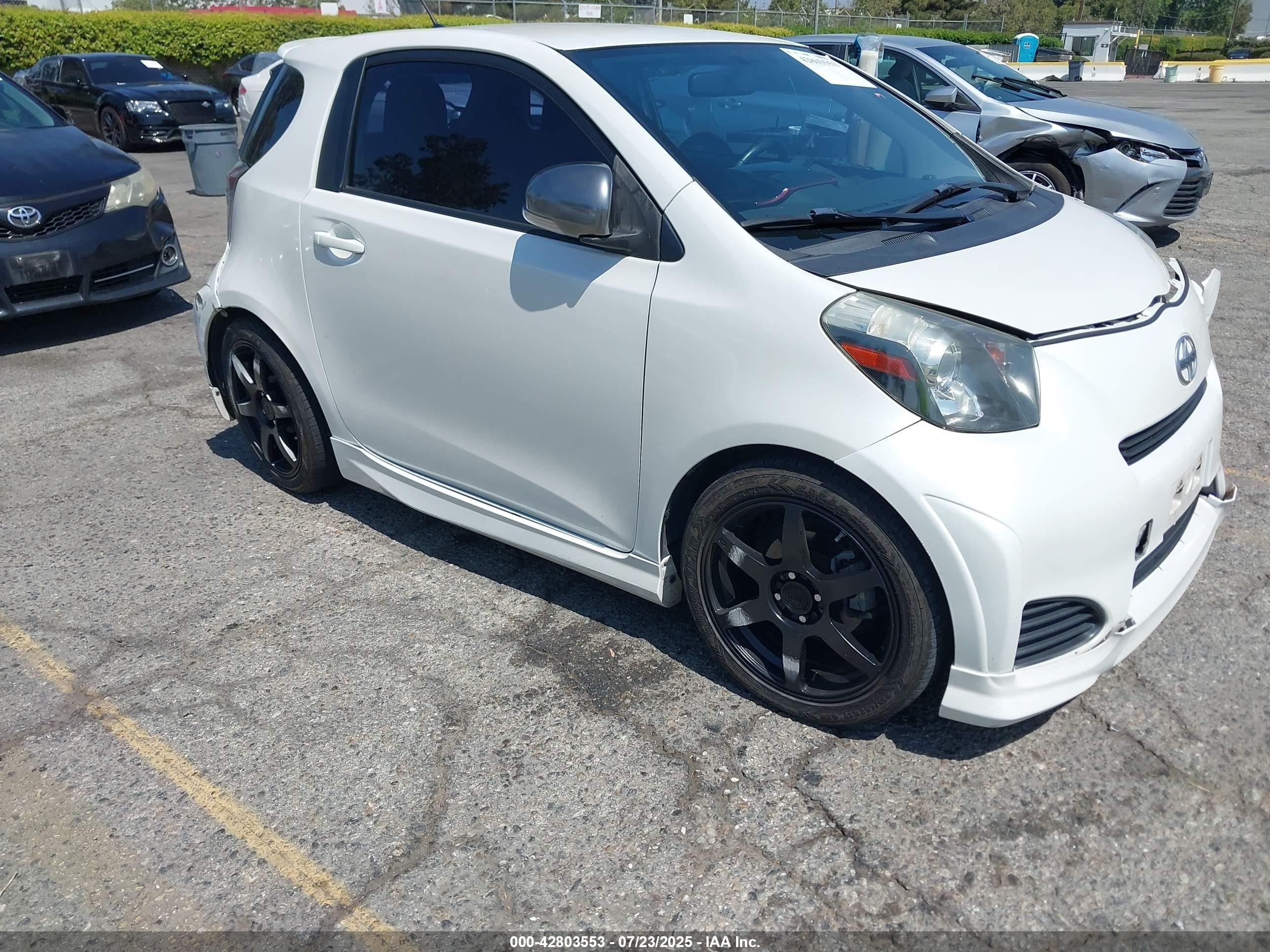 2012 Scion iQ, VIN JTNJJXB01CJ013499 — Front end