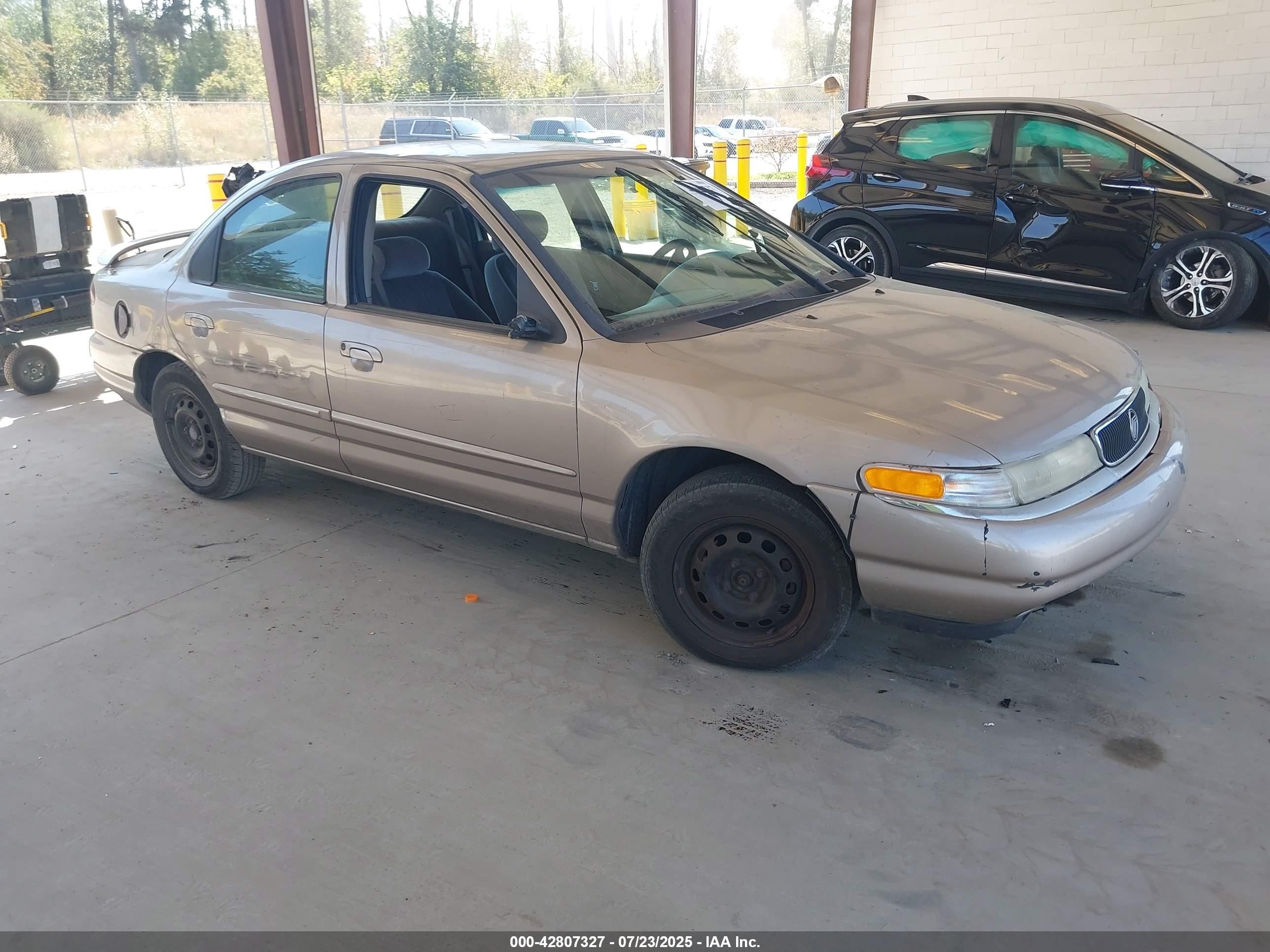1996 Mercury Mystique, VIN 1MELM6535TK600110 — Side