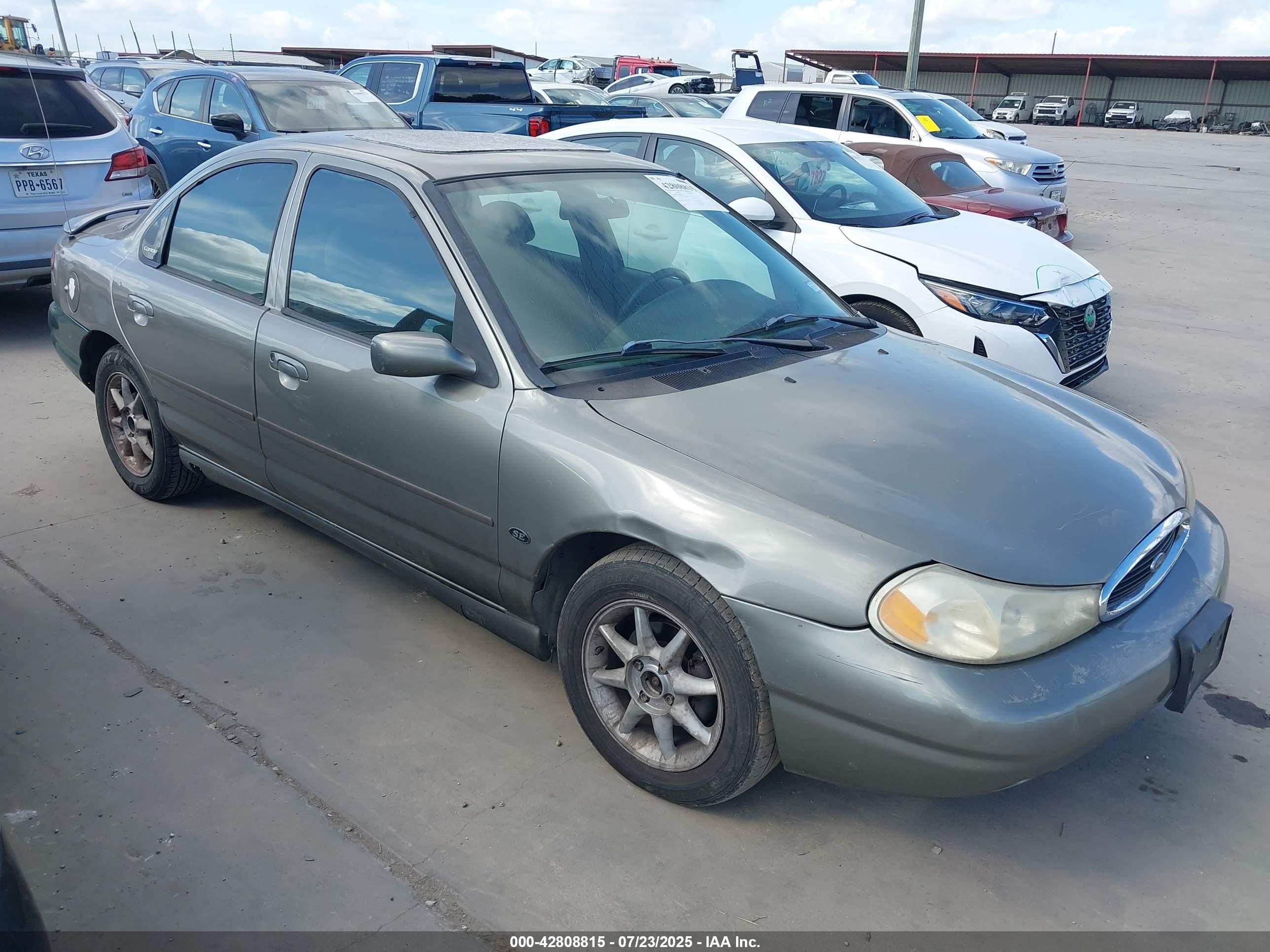 1999 Ford Contour LX, VIN 1FAFP66L9XK201636 — Rear end