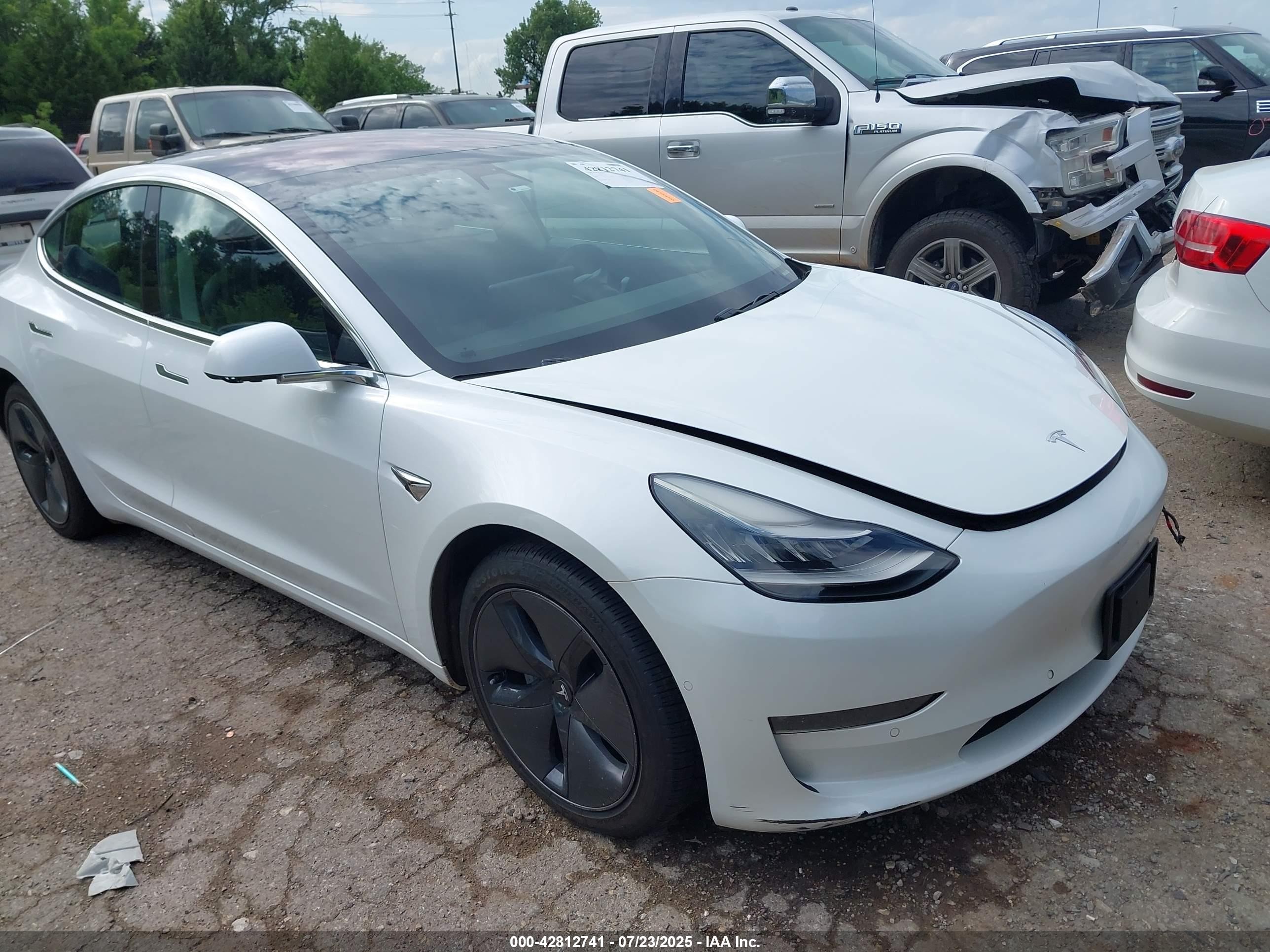 2018 Tesla Model 3 Long Range Battery, VIN 5YJ3E1EB8JF178871 — Rear end