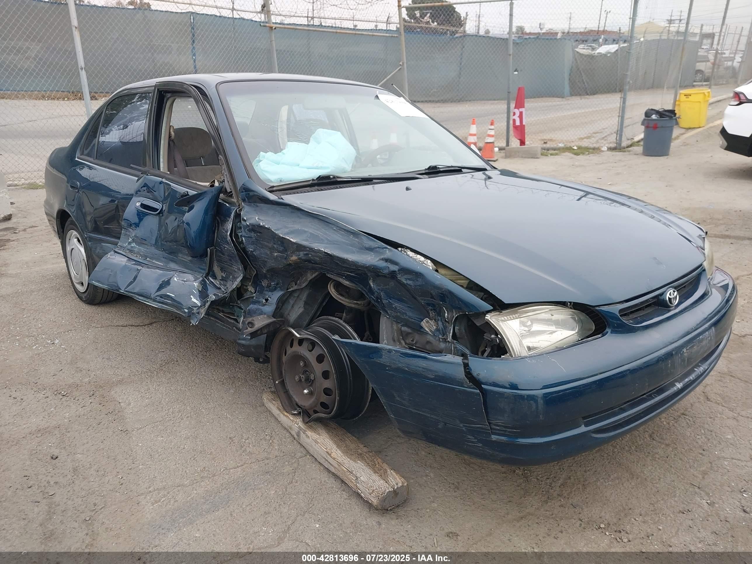 1998 Toyota Corolla VE, VIN 1NXBR18E4WZ029728 — Side