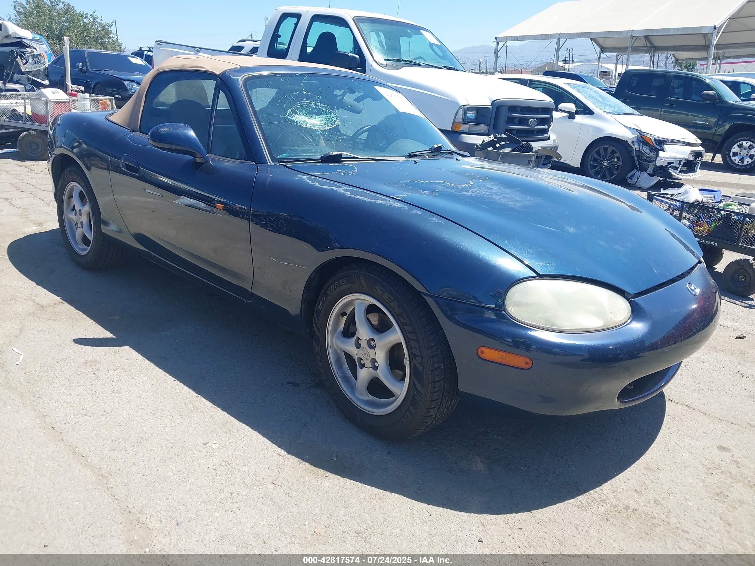 1999 Mazda MX-5 Miata, VIN JM1NB3533X0125928 — Undercarriage