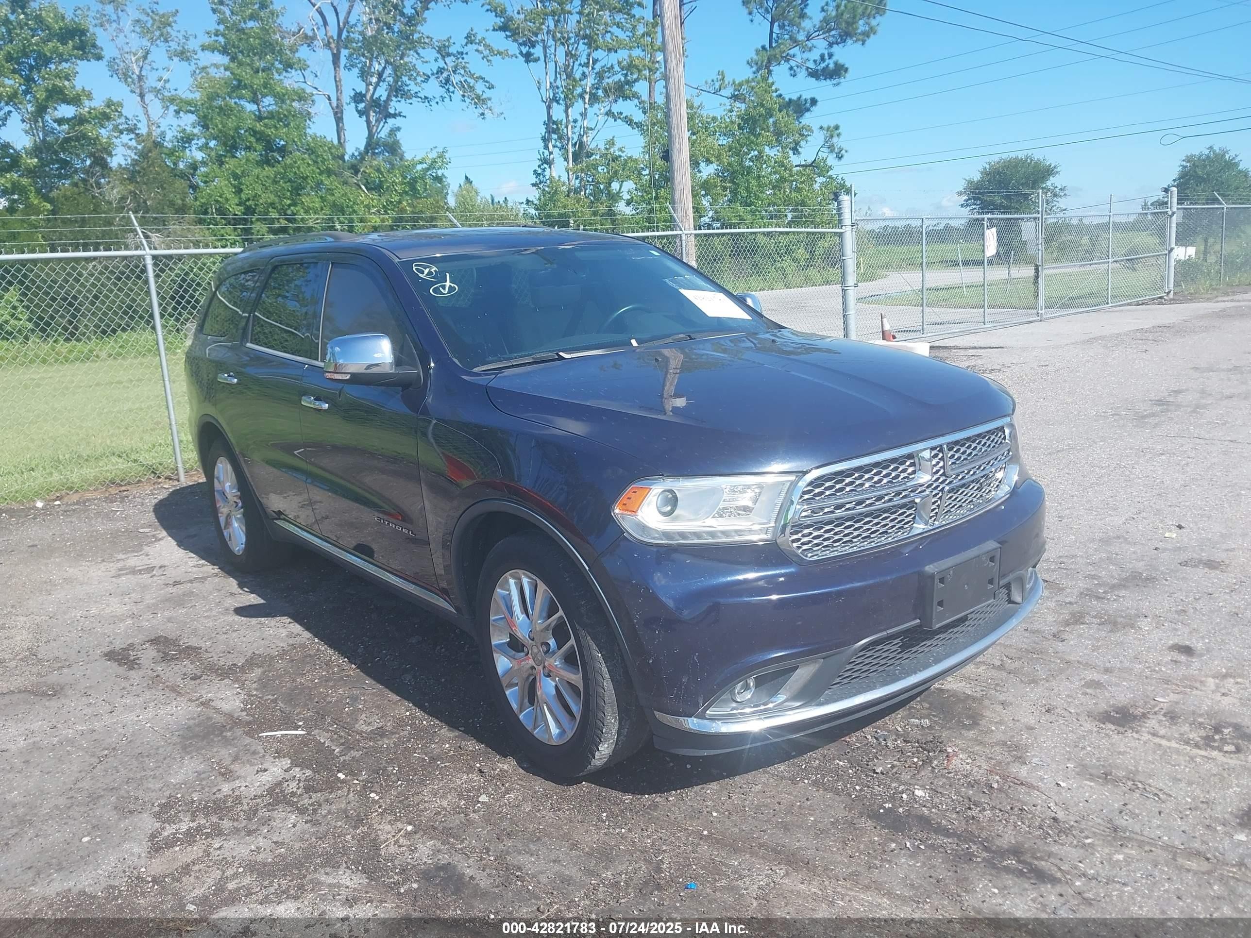 2014 Dodge Durango Citadel, VIN 1C4RDHEG4EC520322 — Side