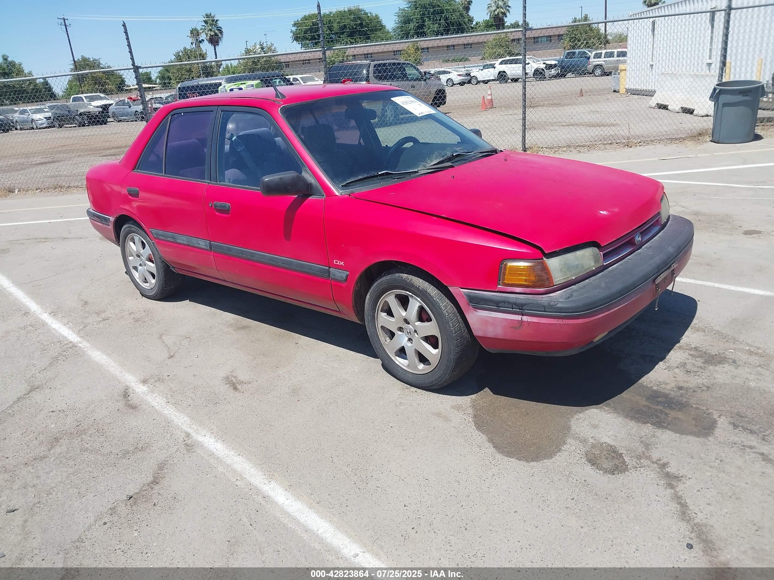 1994 Mazda Protege DX, VIN JM1BG2243R0737710 — Бок