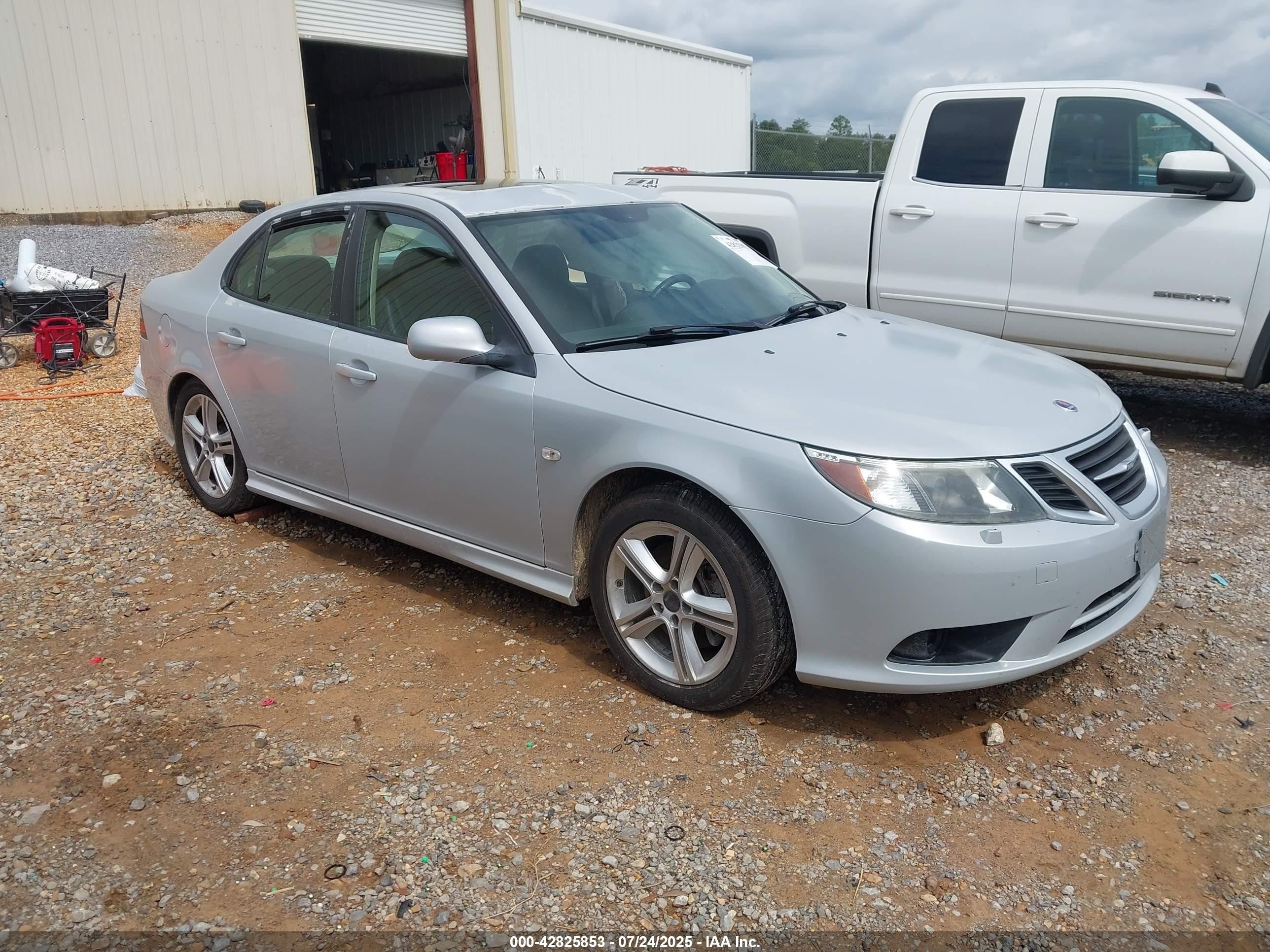 2010 Saab 9-3 XWD, VIN YS3FA4BY8A1609973 — Side