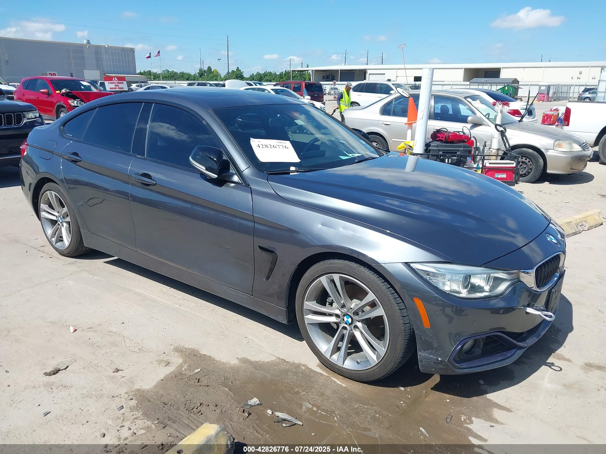 2015 BMW 4 Series 428i, VIN WBA4A5C50FG051577 — Water / flood