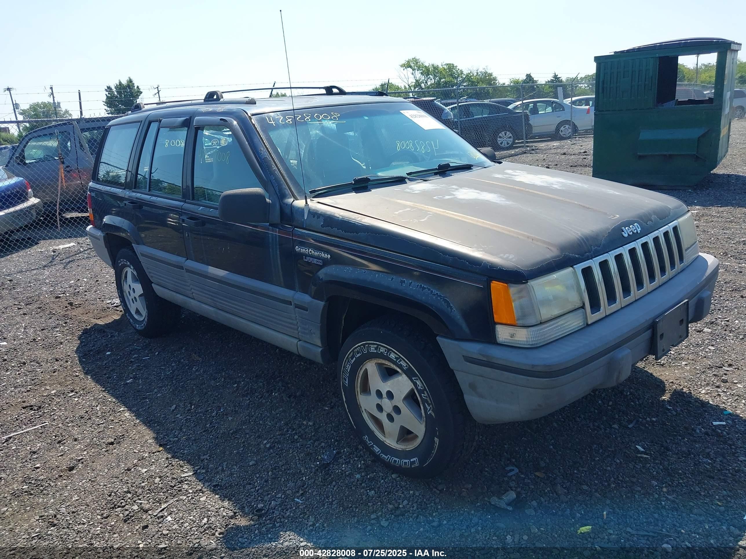 1995 Jeep Grand Cherokee Laredo, VIN 1J4GZ58S9SC626889 — Side