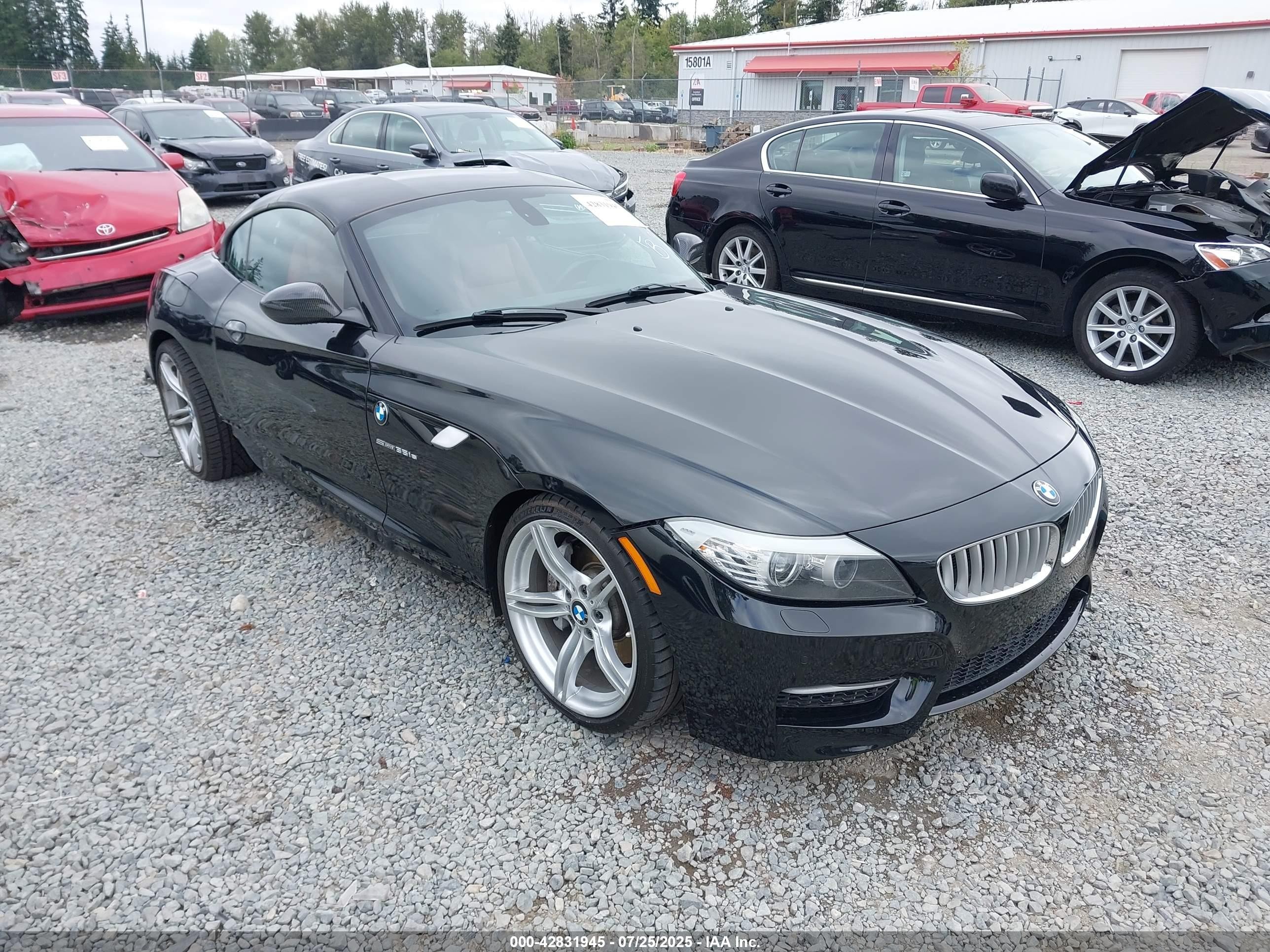 2012 BMW Z4 sDrive35is, VIN WBALM1C57CE633579 — Бок