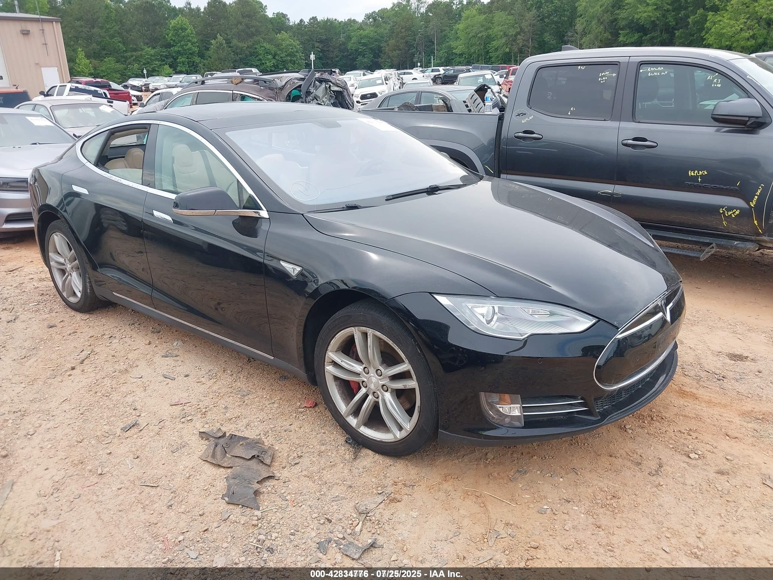 2014 Tesla Model S 60, VIN 5YJSA1H10EFP34137 — Theft recovery