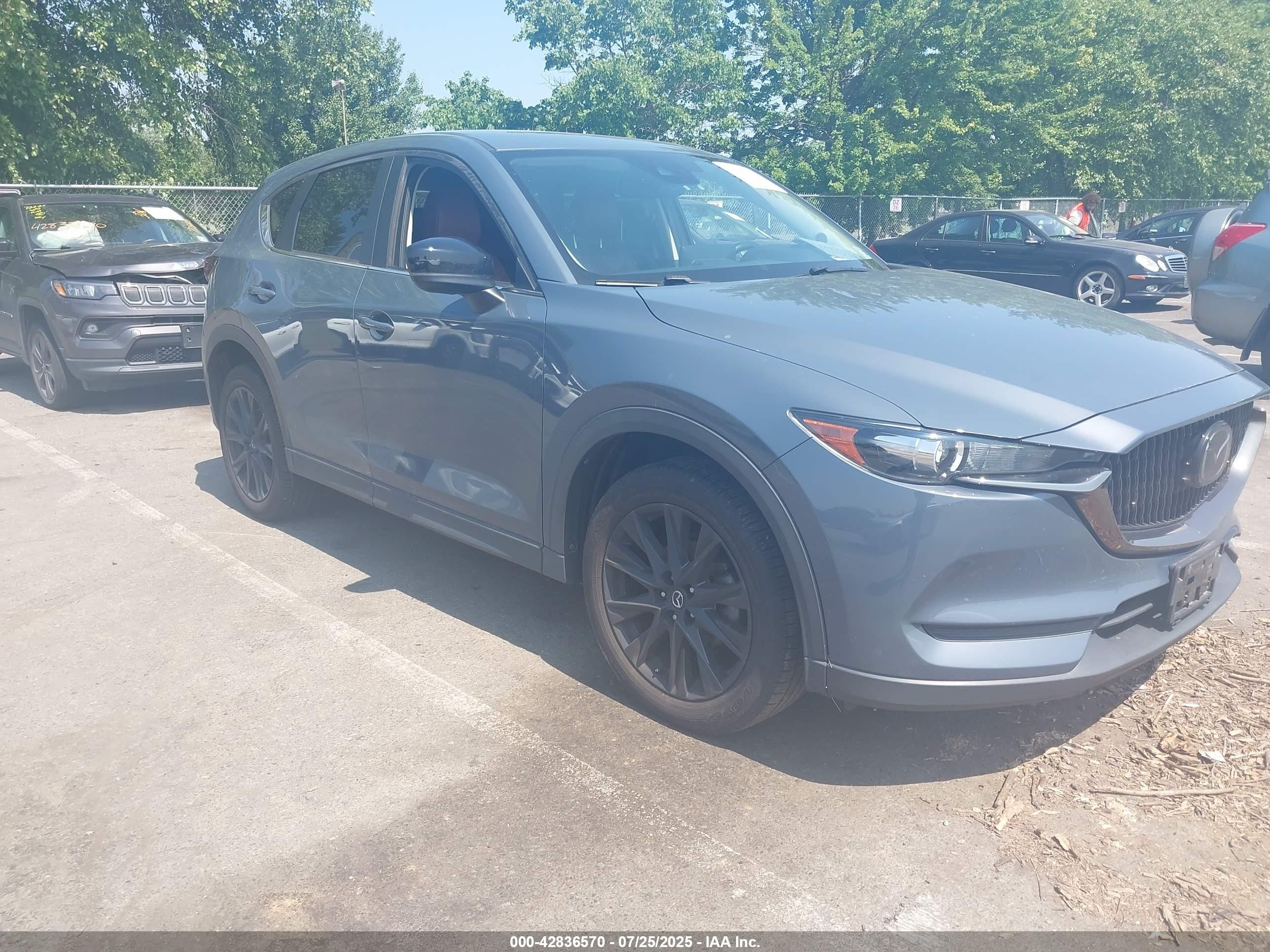 2021 Mazda CX-5 Touring, VIN JM3KFBCM9M0426512 — Water / flood
