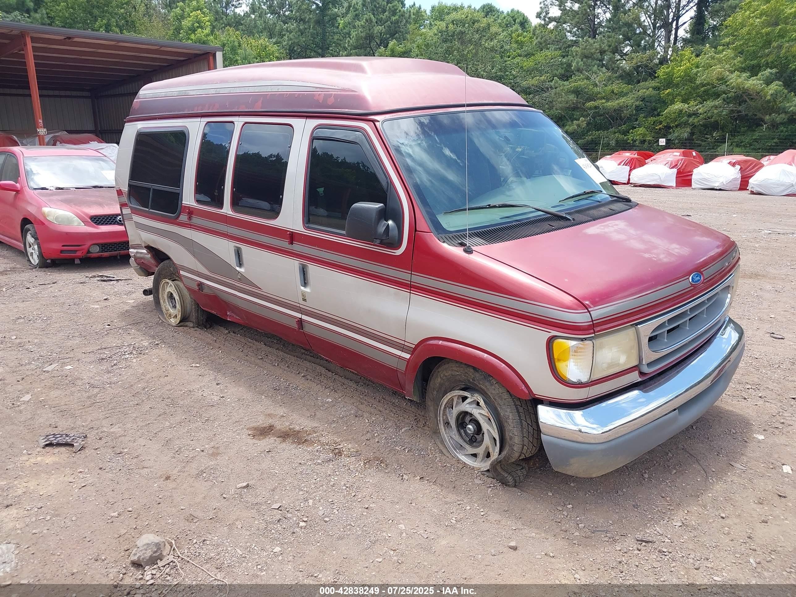 1997 Ford Econoline Commercial, VIN 1FDEE14LXVHA01503 — Side
