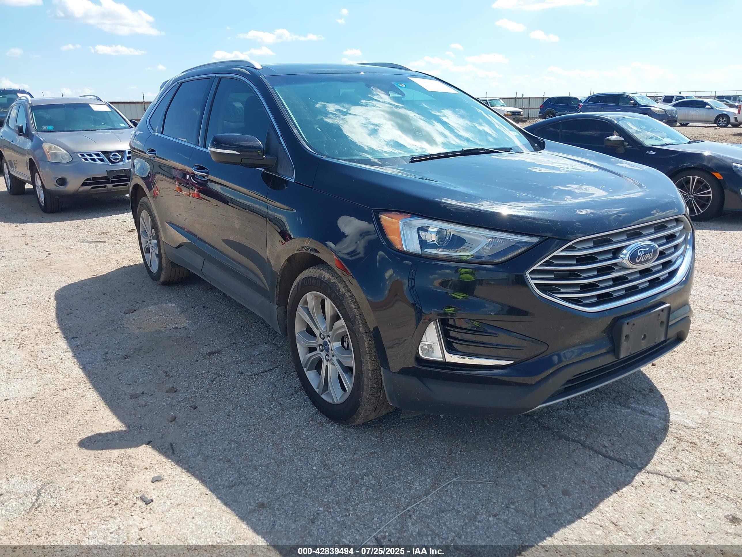 2019 Ford Edge Titanium, VIN 2FMPK4K94KBC19925 — Hail
