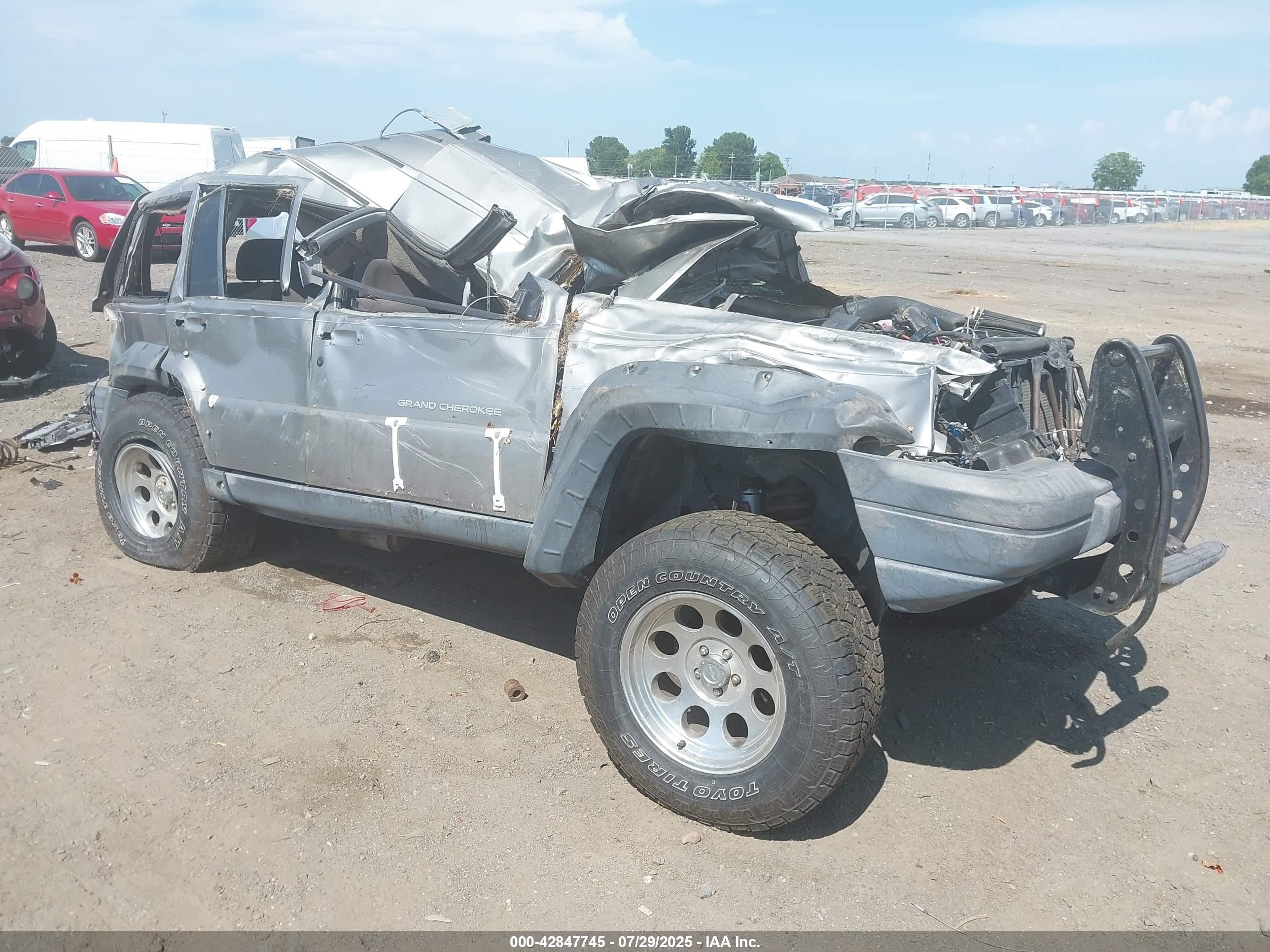 1998 Jeep Grand Cherokee Laredo, VIN 1J4GZ58S6WC244888 — Rollover
